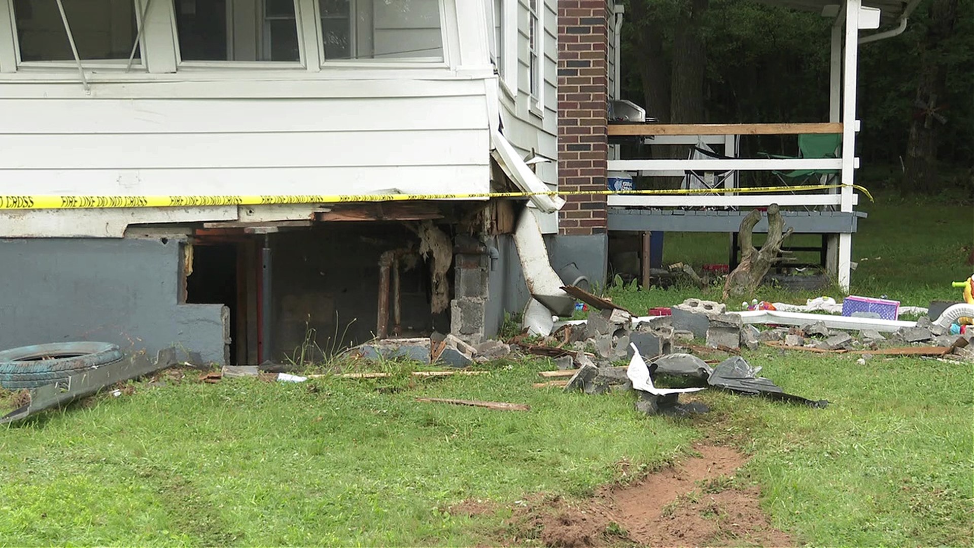 The crash left a hole under the front porch of the place in Hazle Township.