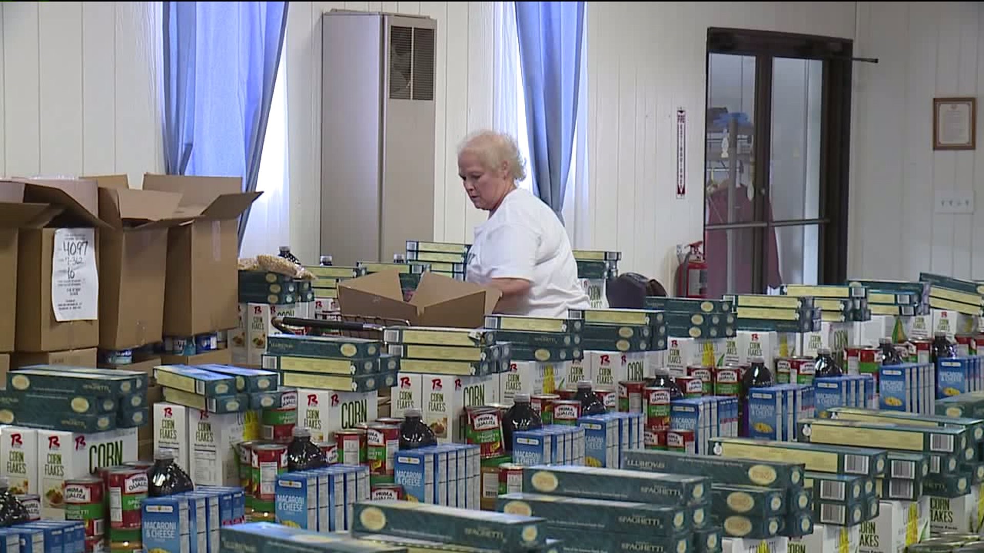 Volunteers Prepare for Massive Food Basket Giveaway