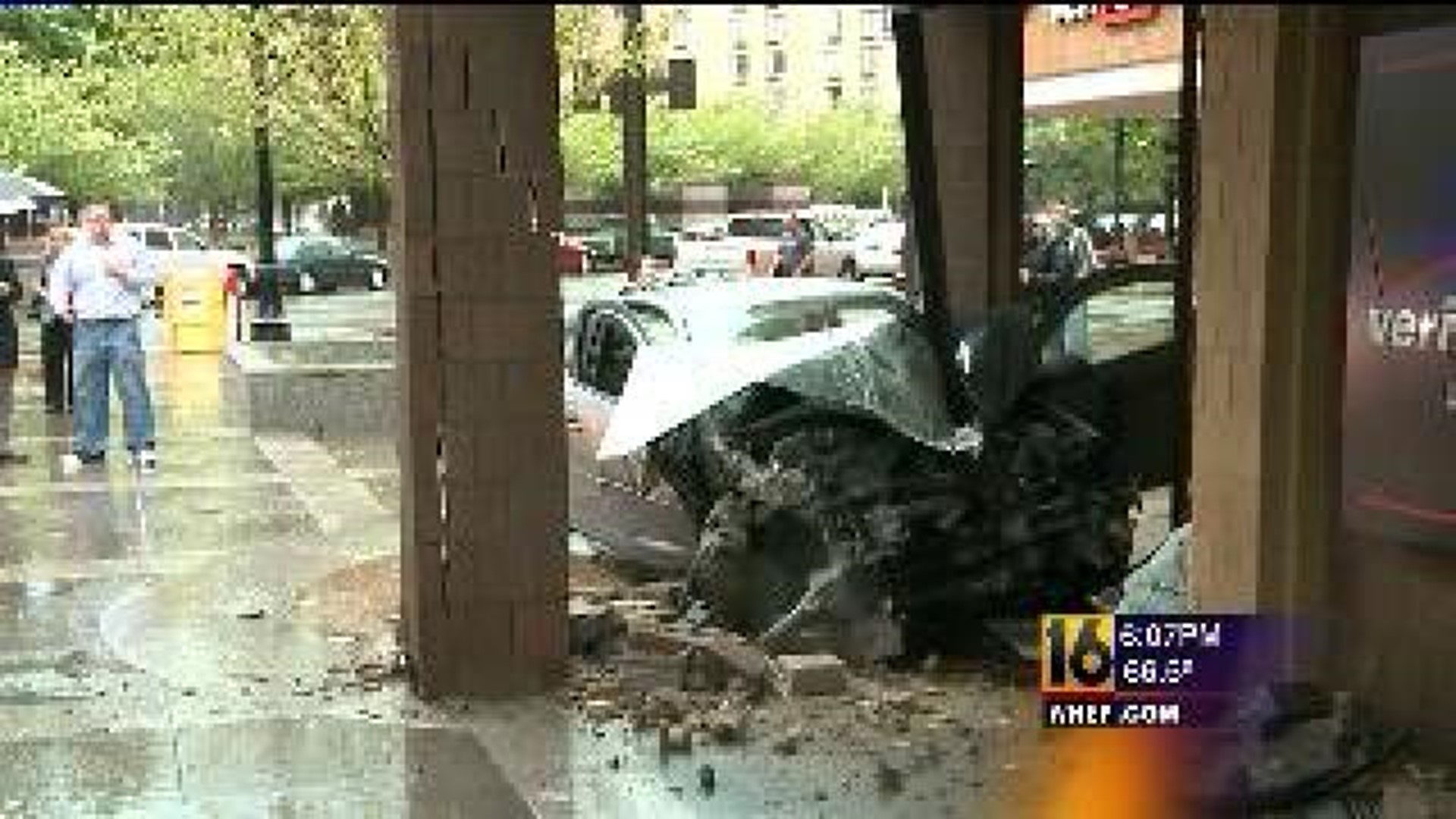 Car Smashes Into Building on Public Square