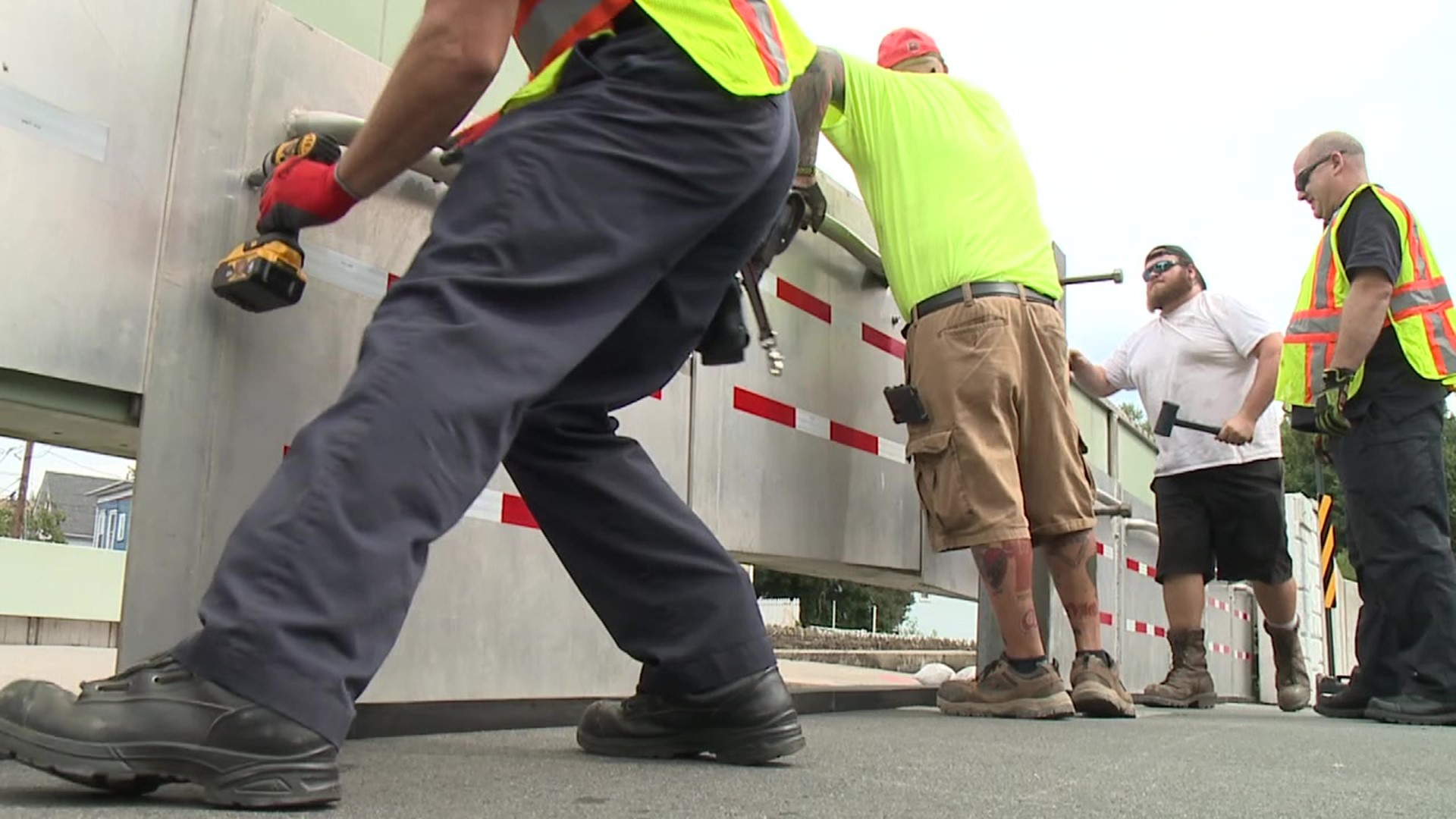 Emergency officials were on the job Tuesday in Wilkes-Barre, closing floodgates and getting ready as rain from the remnants of Ida get closer.