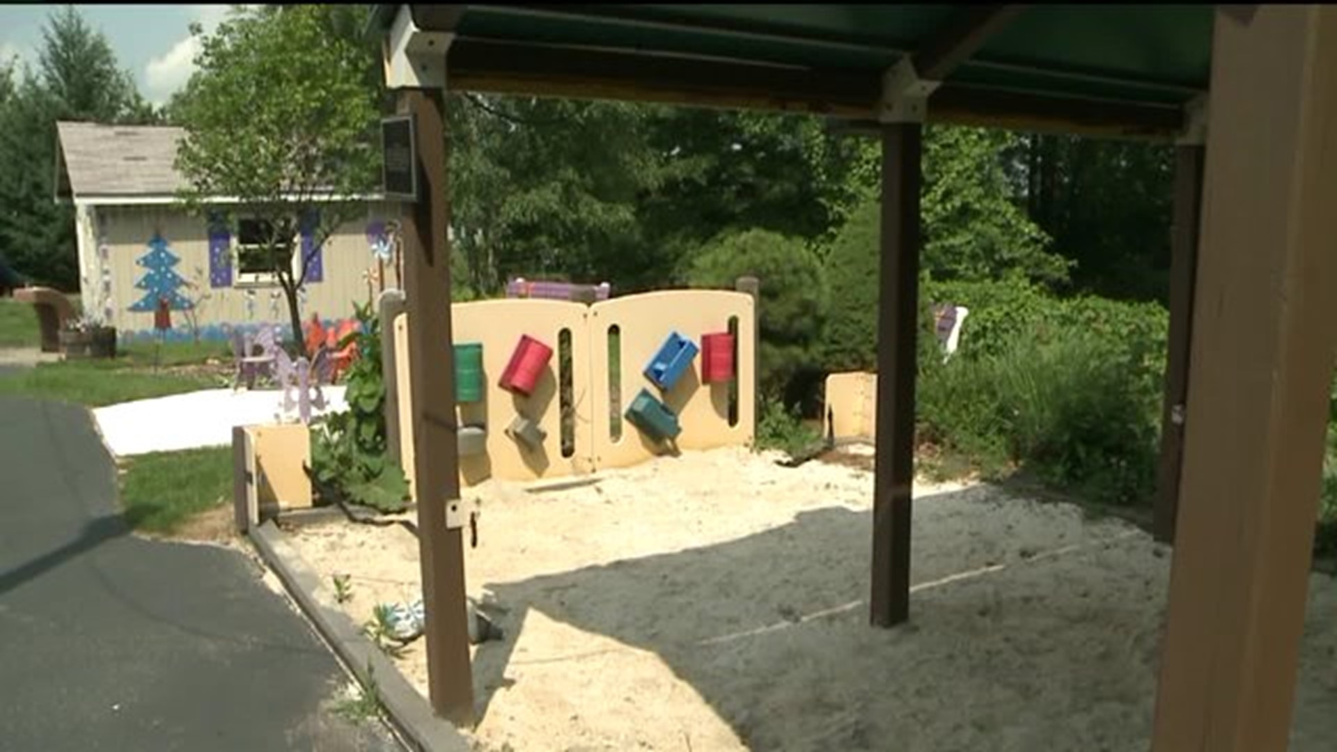 Parent Cleans Up Playground Covered in Sand