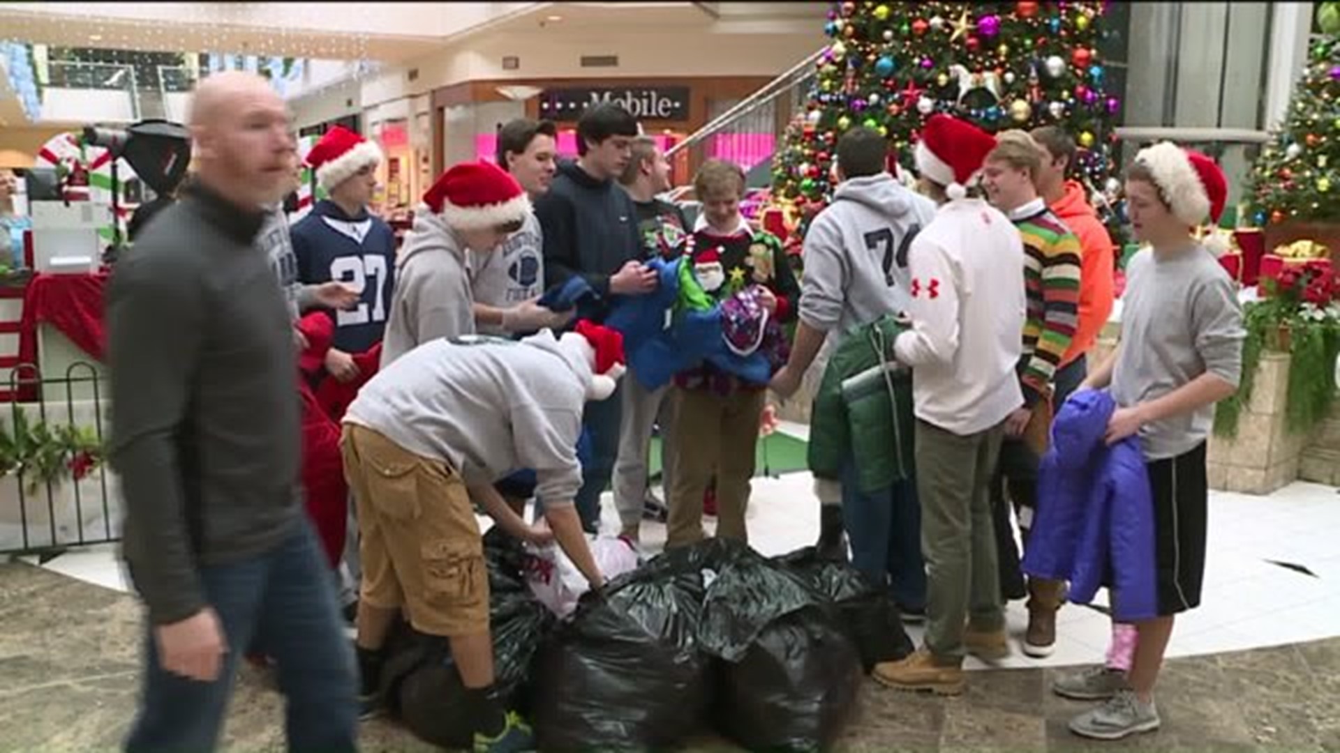 Football Team Collects Coats for Kids