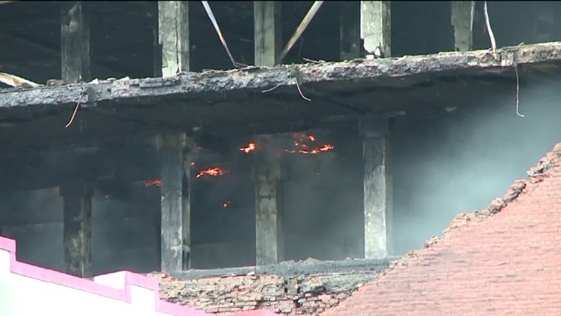 Tire Fire Still Burning As Building Is Demolished