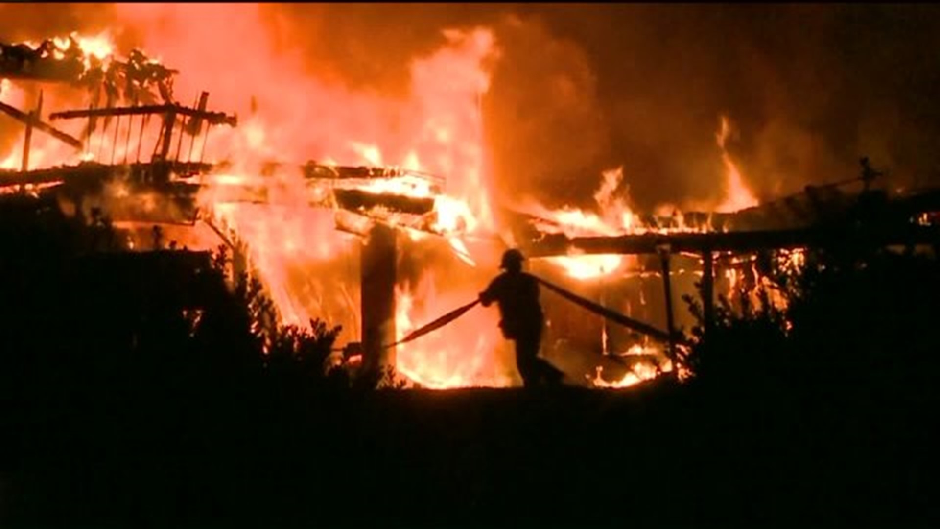 Residents Flee Inn During Blaze