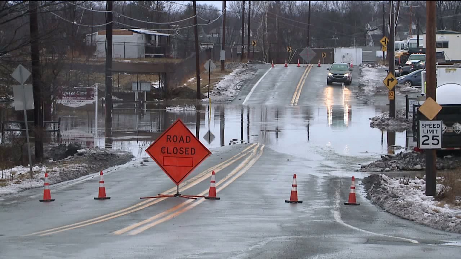 Rain, Melting Snow Leads to Flooded Roads, Yards