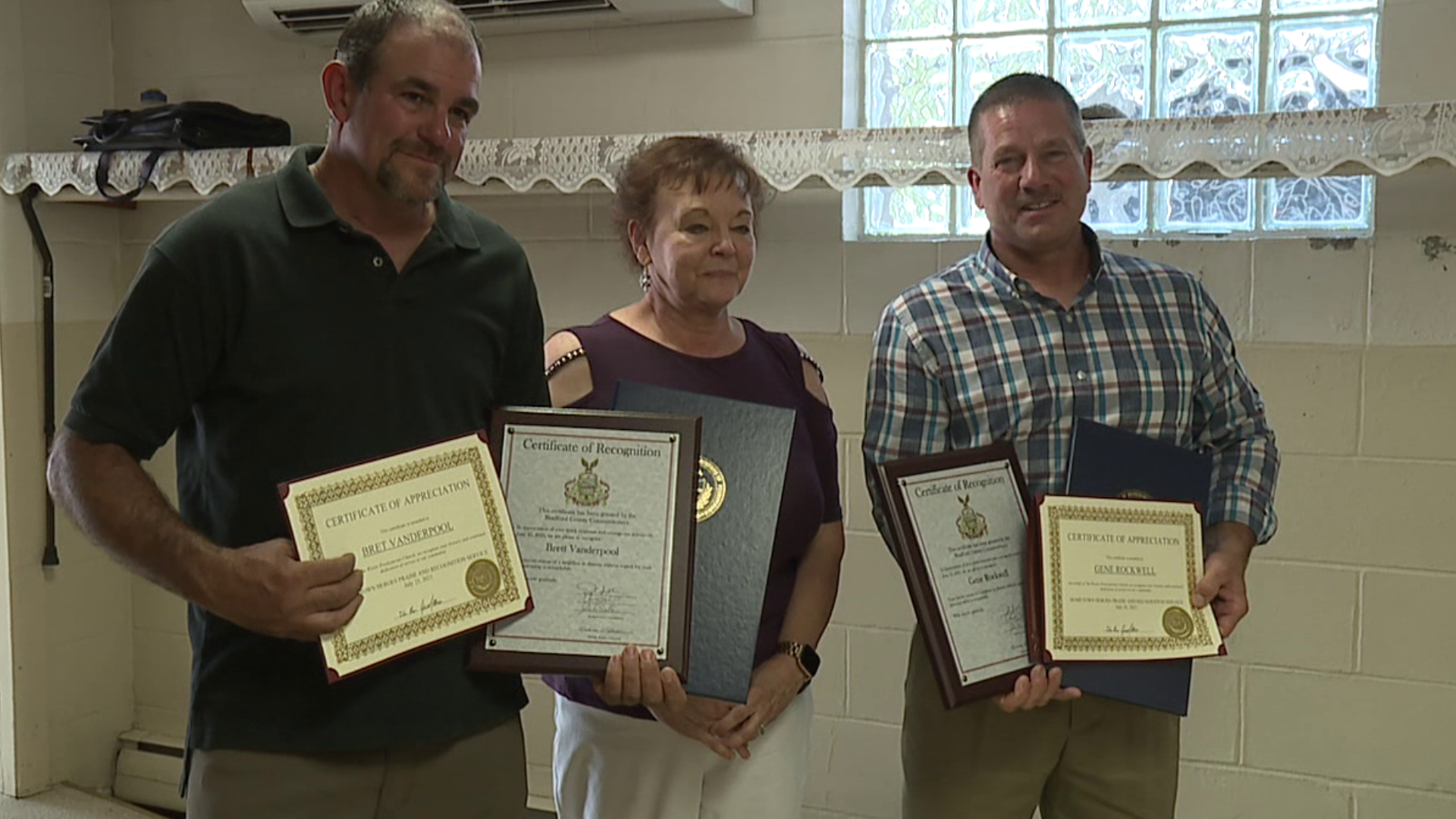 Three utility workers are being hailed as heroes after saving a woman from a fire last month in Bradford County.