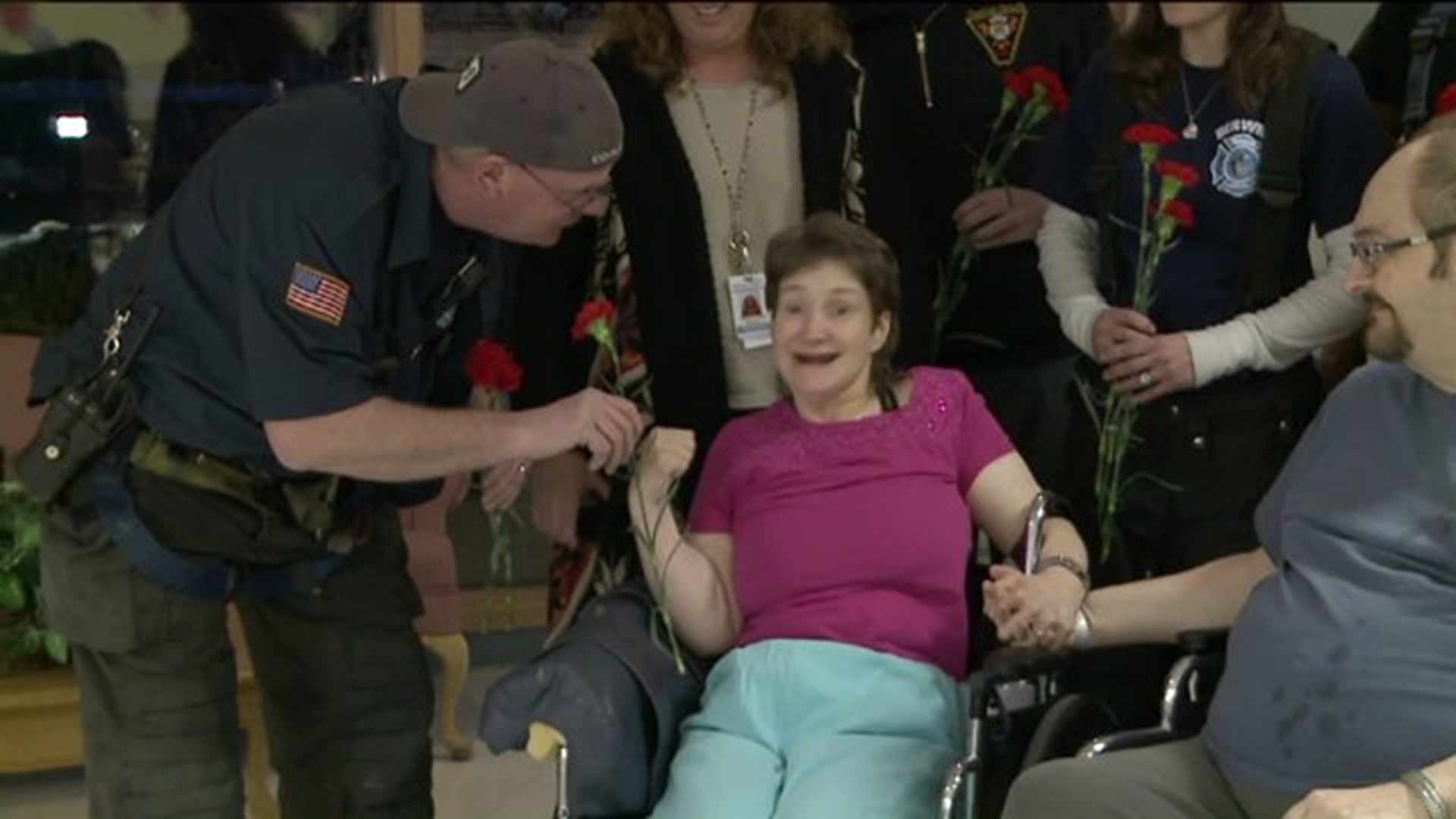 Firefighters Hand Out Carnations at Berwick Retirement Village for Valentine`s Day