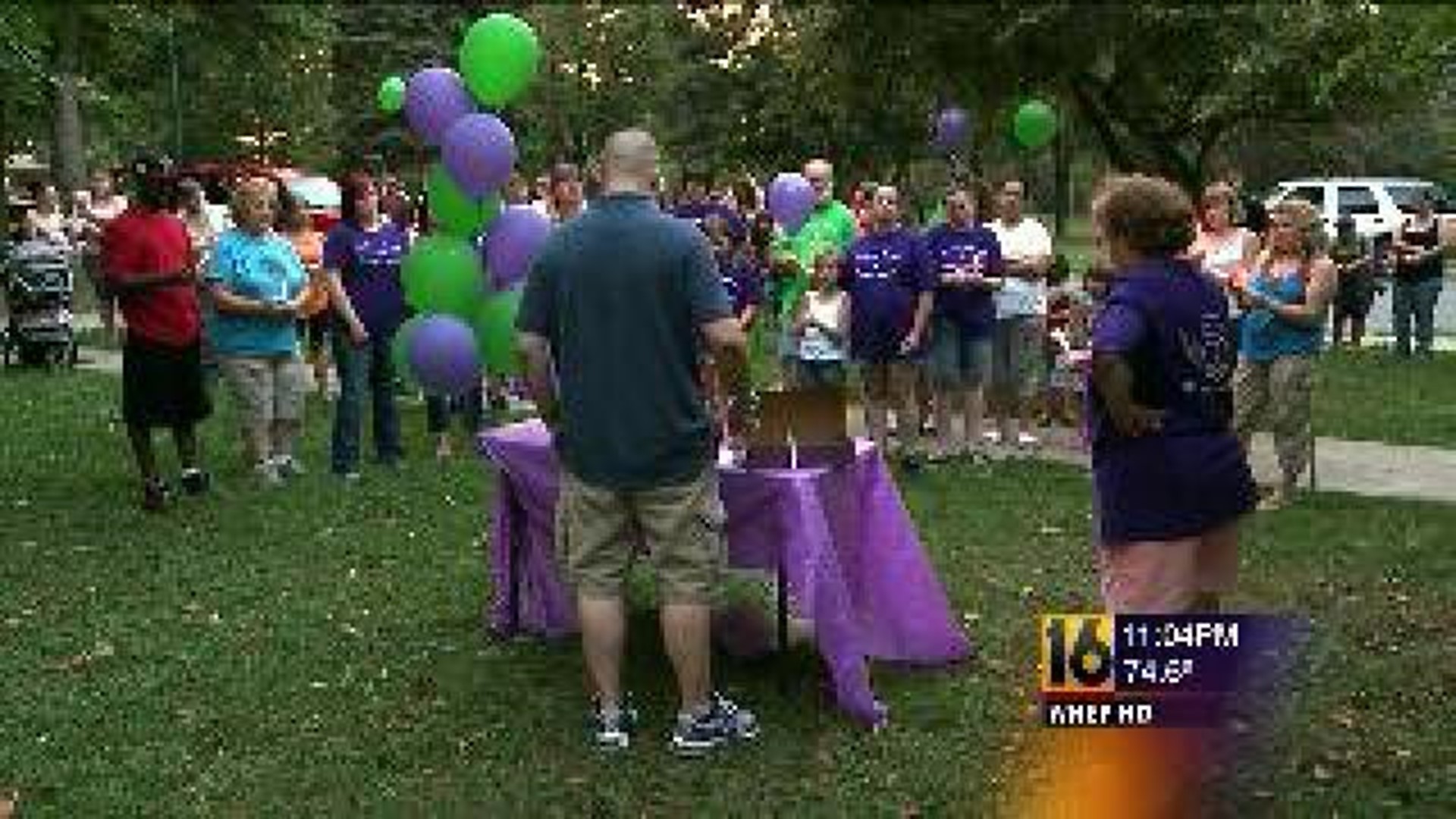 Vigil Held for Unsolved Murder of Woman and Child