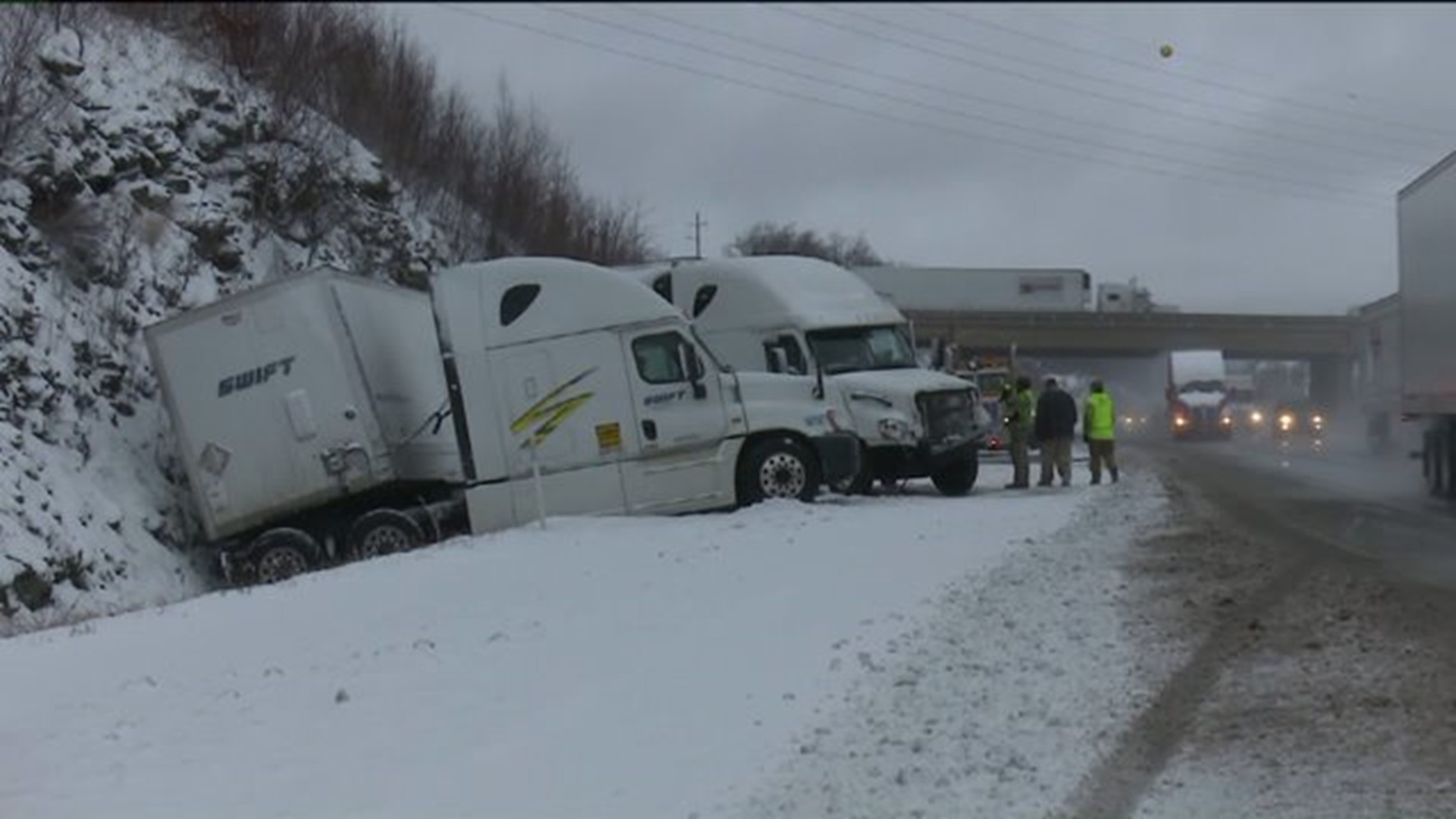 Icy Roads Cause Problems for Two Big Rigs on the Interestate