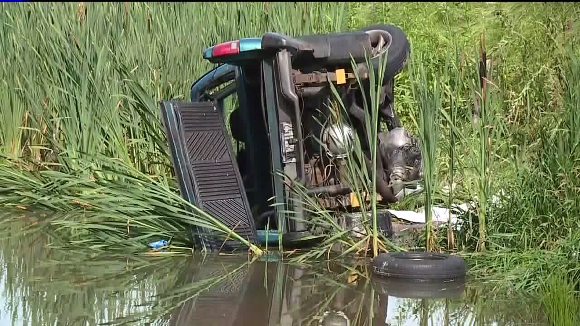 Pickup Lands in Pond After Crash in Columbia County