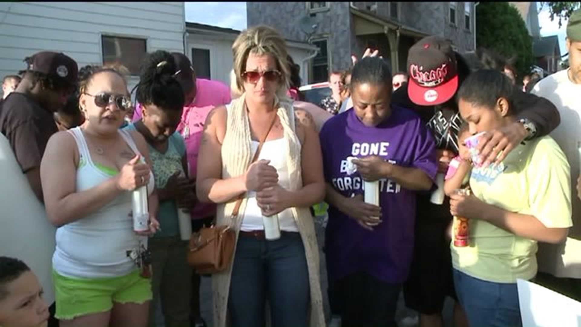 Community Gathers for Vigil for Shooting Victim