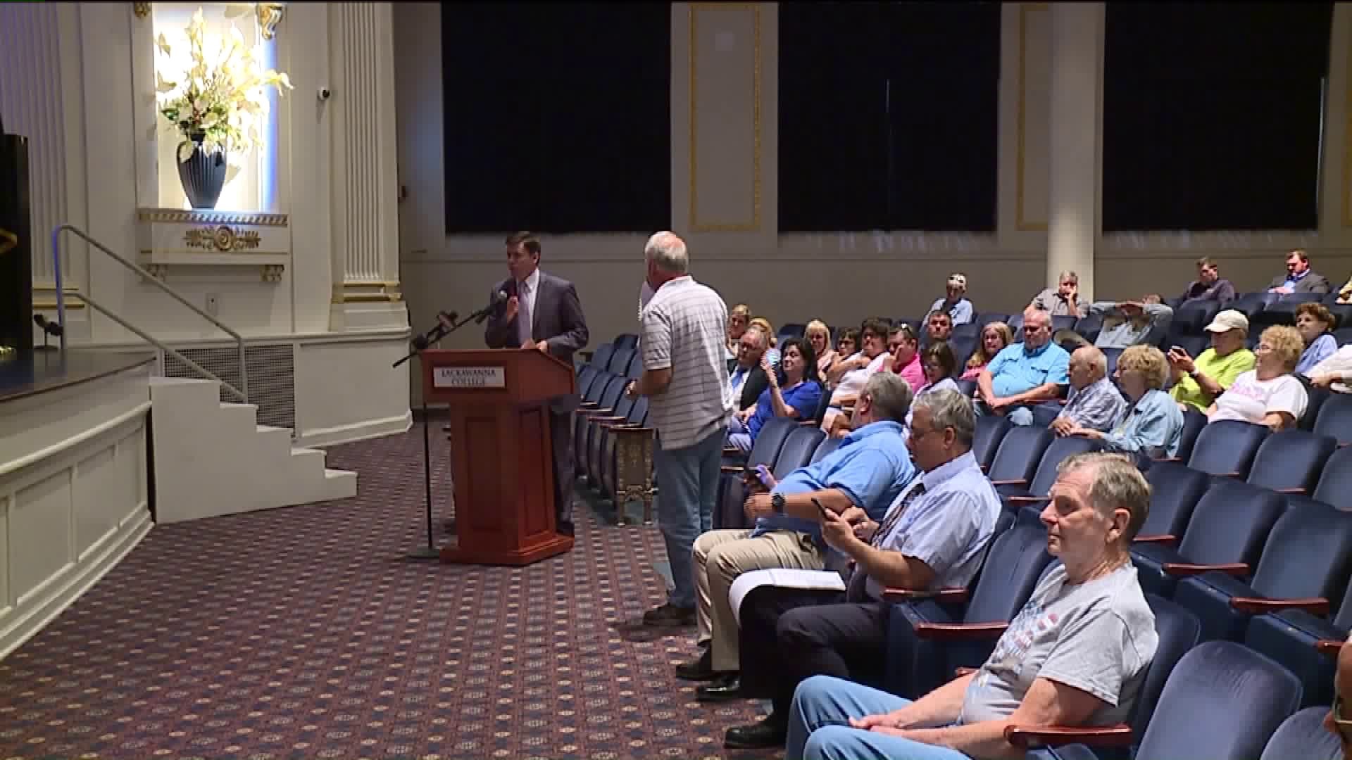 Town Hall Meeting: Protests and Points in Favor