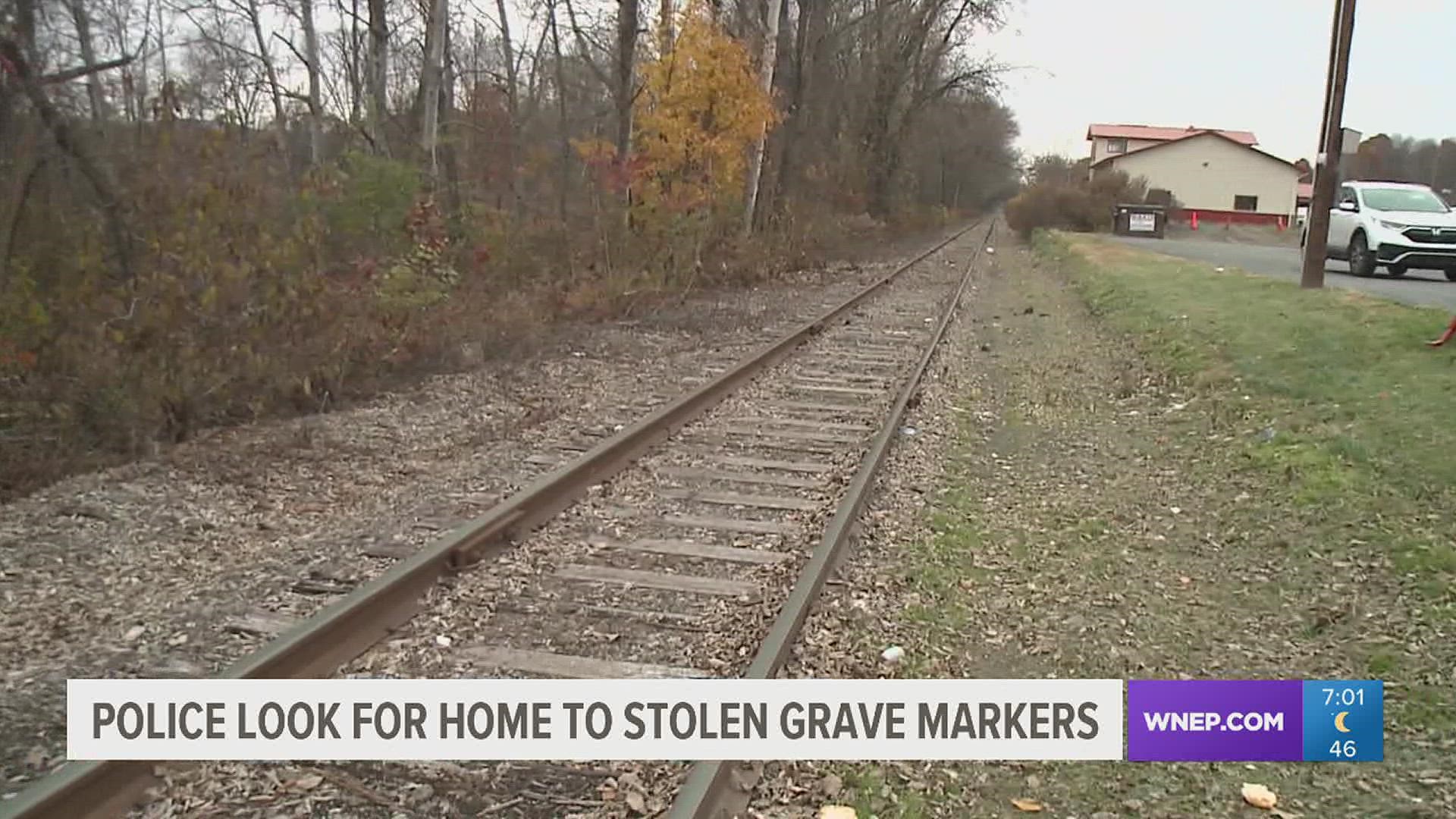 19 veteran grave markers were recovered near railroad tracks in Plains Township.