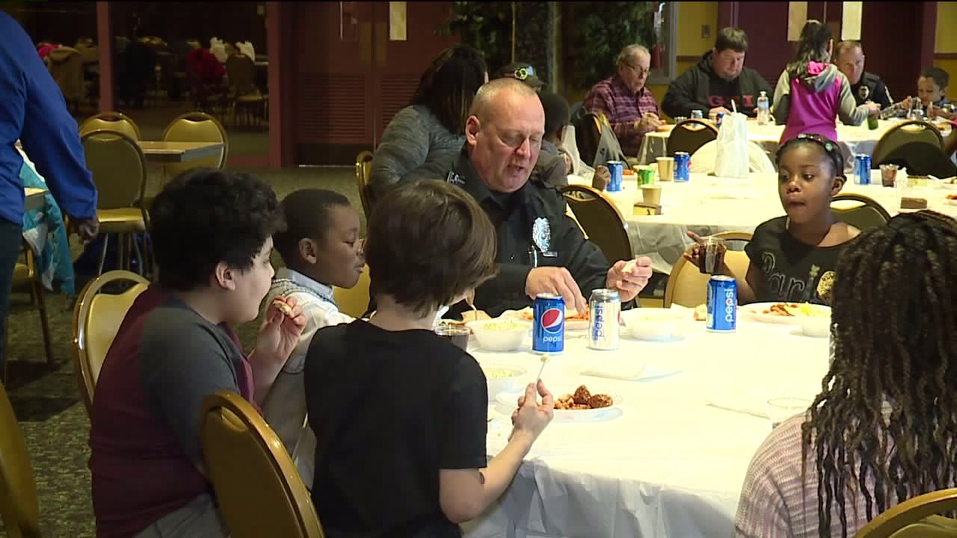 Children Have Lunch with Police Officers