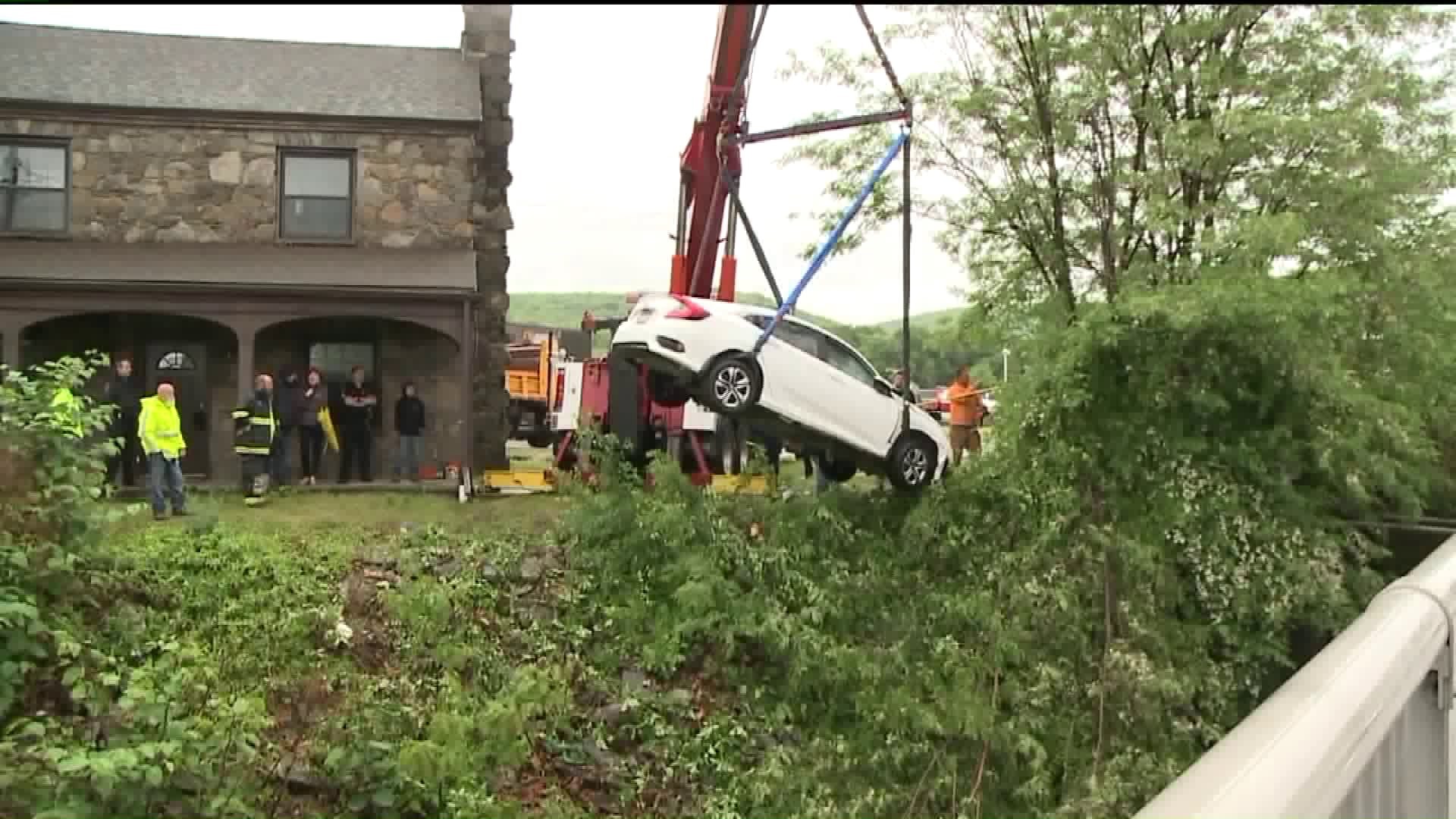Crews Pull Car from Creek in Luzerne