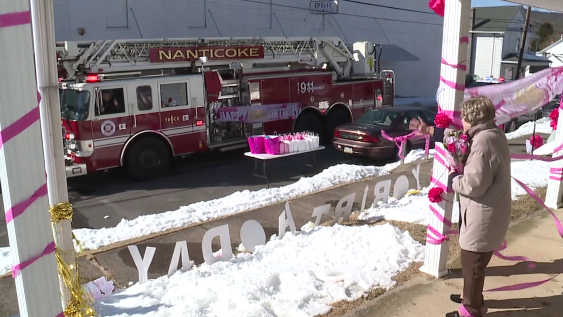 More than 50 friends including police and firefighters drove past her home to wish her a happy birthday.