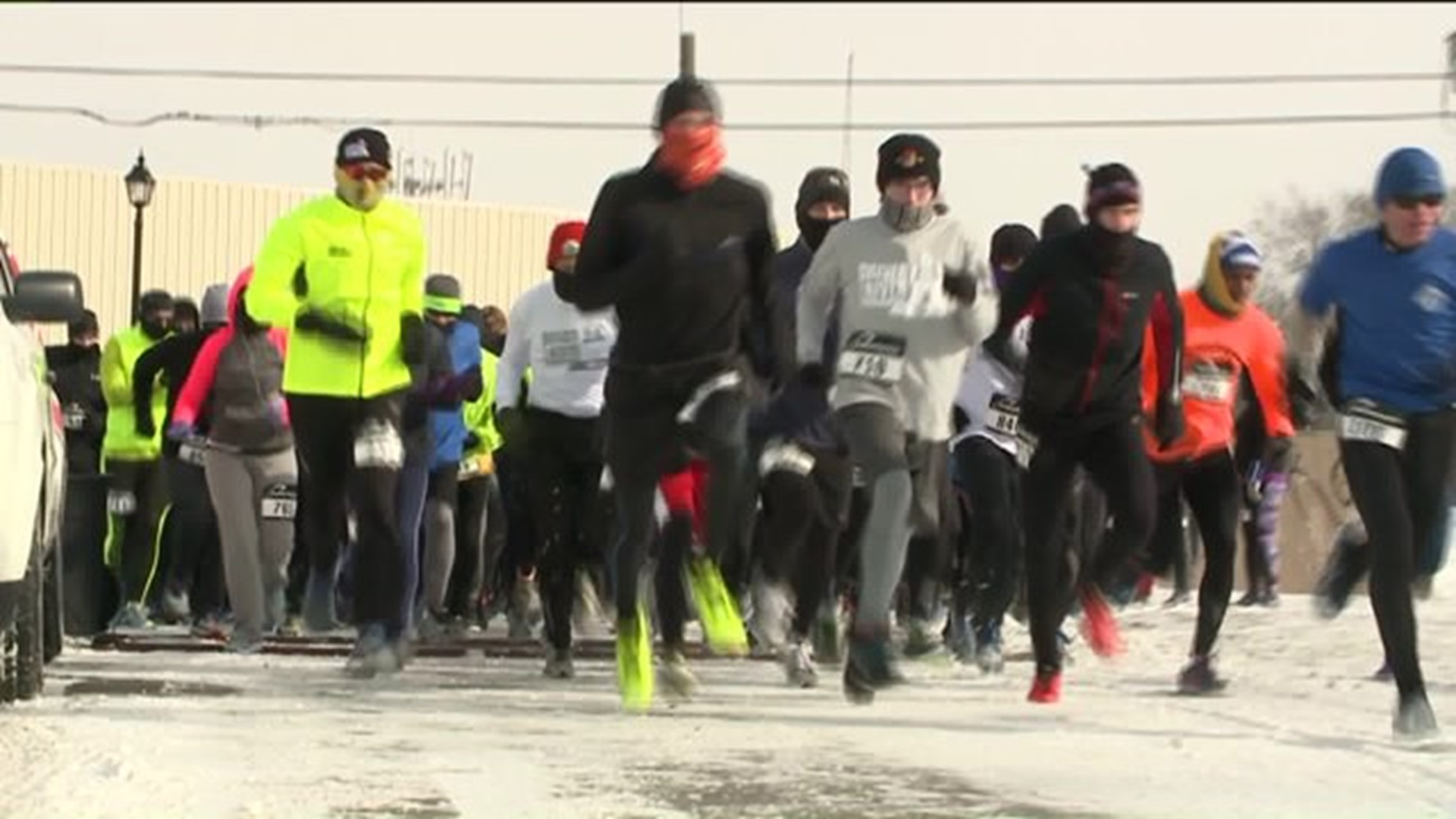 Runners Fight Wind Chill for Shiver by the River Event