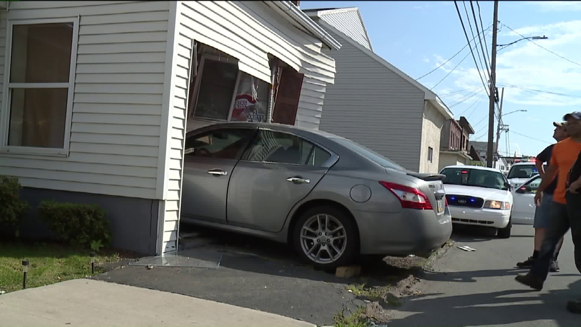 Car Plows into Home in Taylor