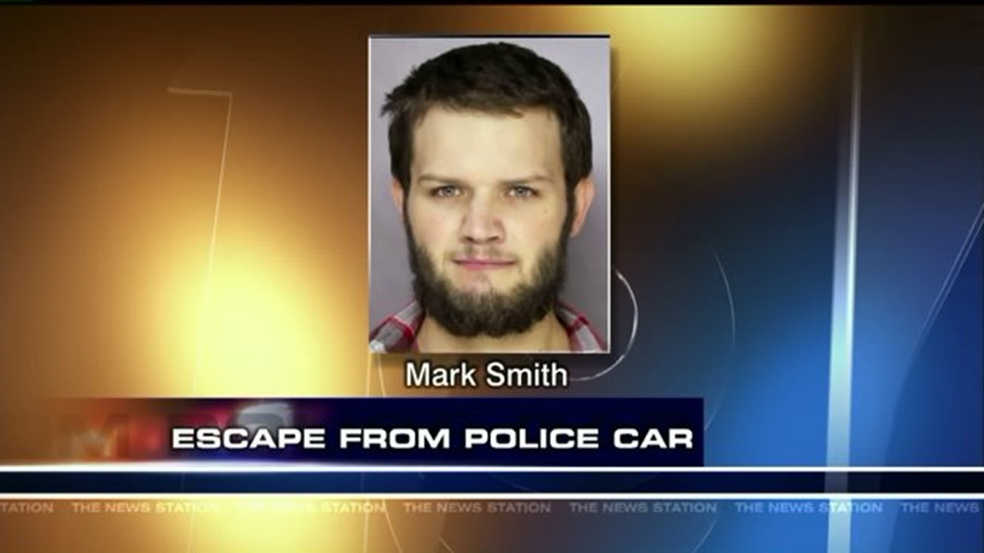 Suspect on the Loose after Escaping from Police Car