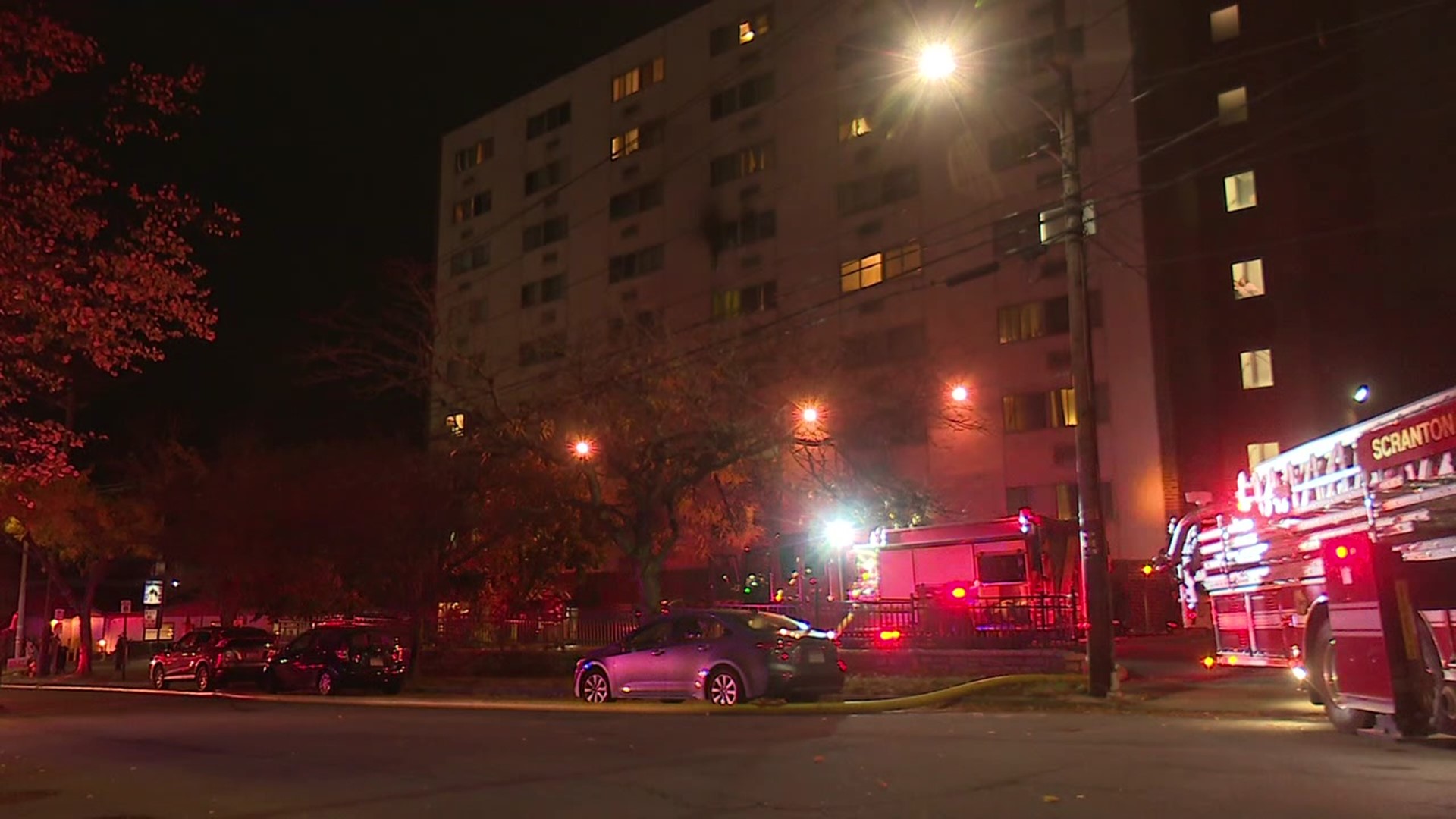 A fire at United House Apartments killed one man, injured two others, and forced more than 100 people from their homes.