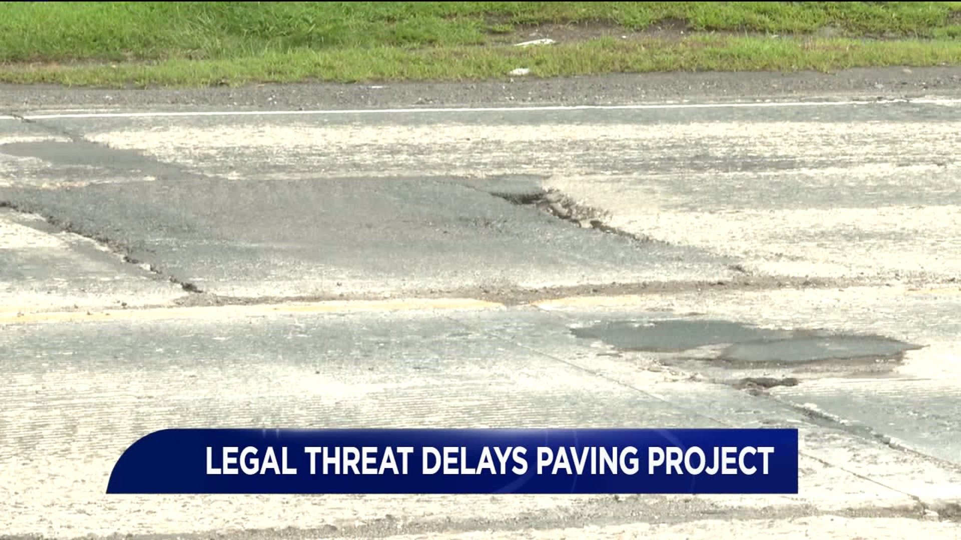 Legal Threat Delays Paving Project