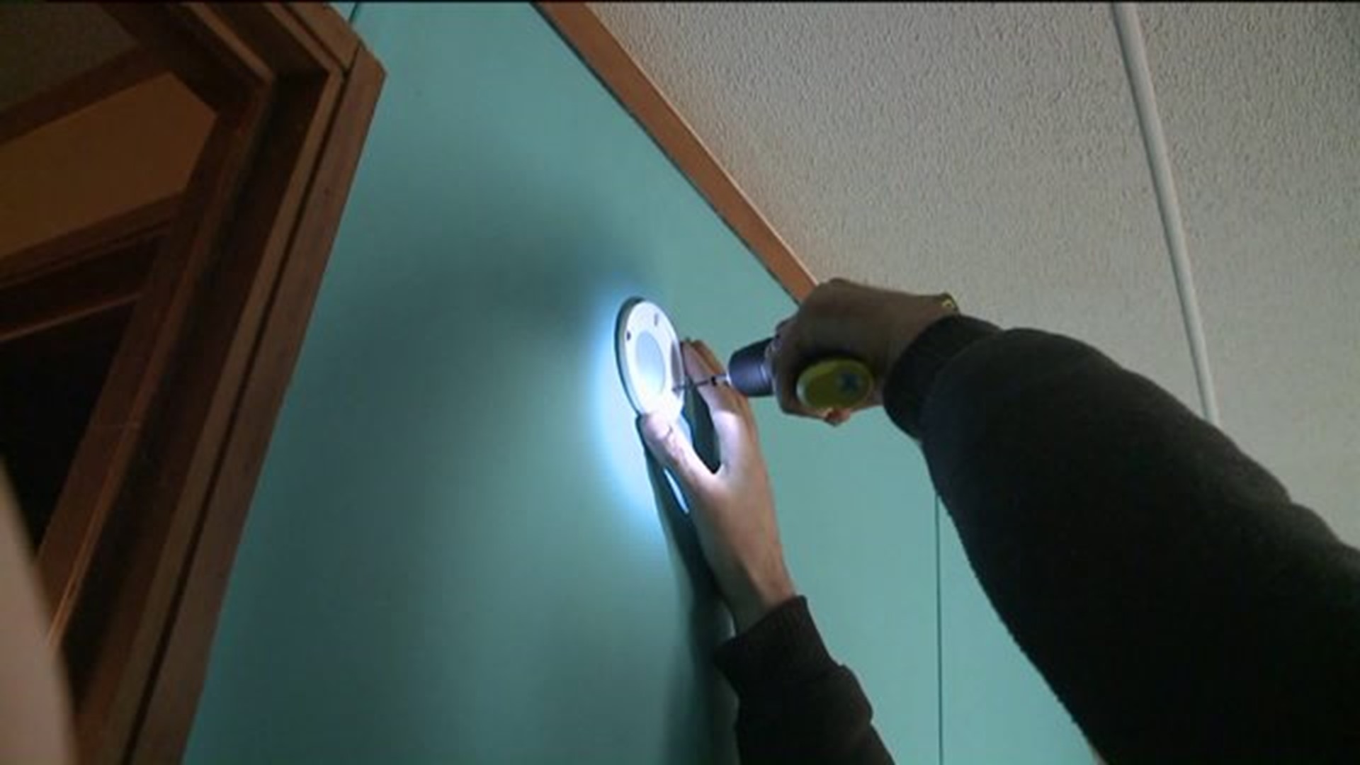 Area Firefighters Help Install Smoke Alarms