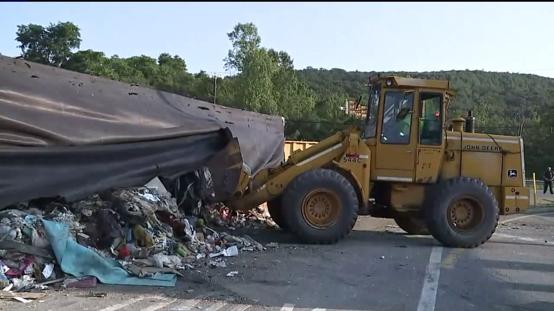 Bulldozer Helps Clean up Tractor-Trailer Crash