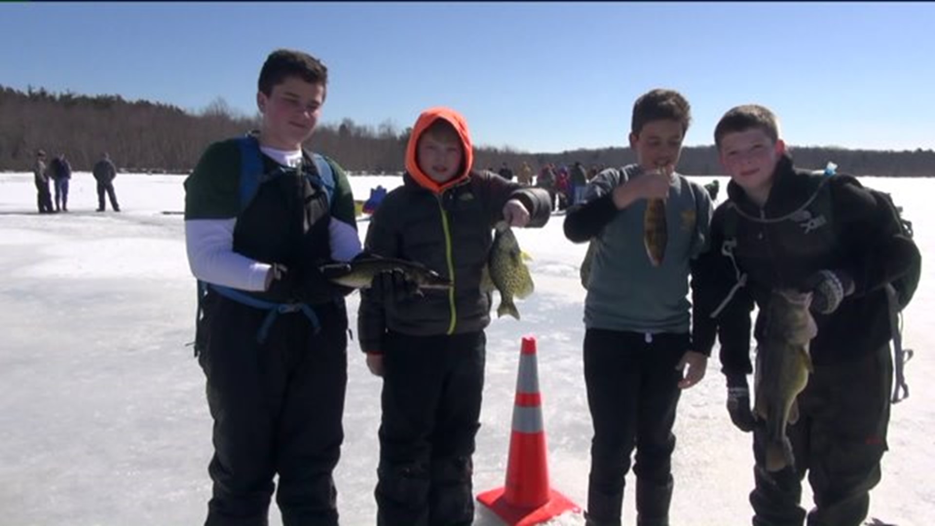 Boy Scouts Go Fishing on Frozen Lake in Monroe County