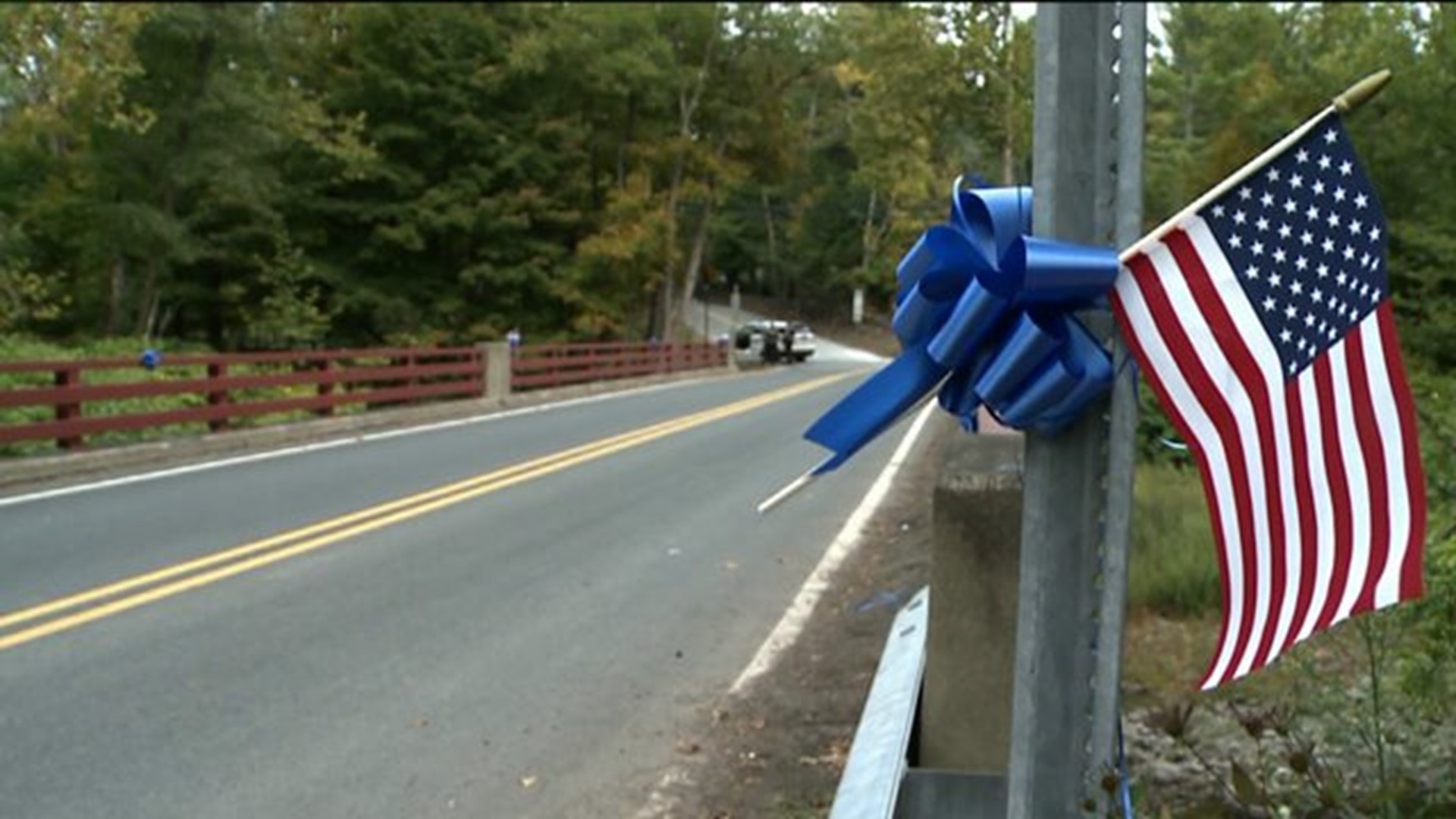 Community Hangs Blue Ribbons To Show Support To Men In Blue