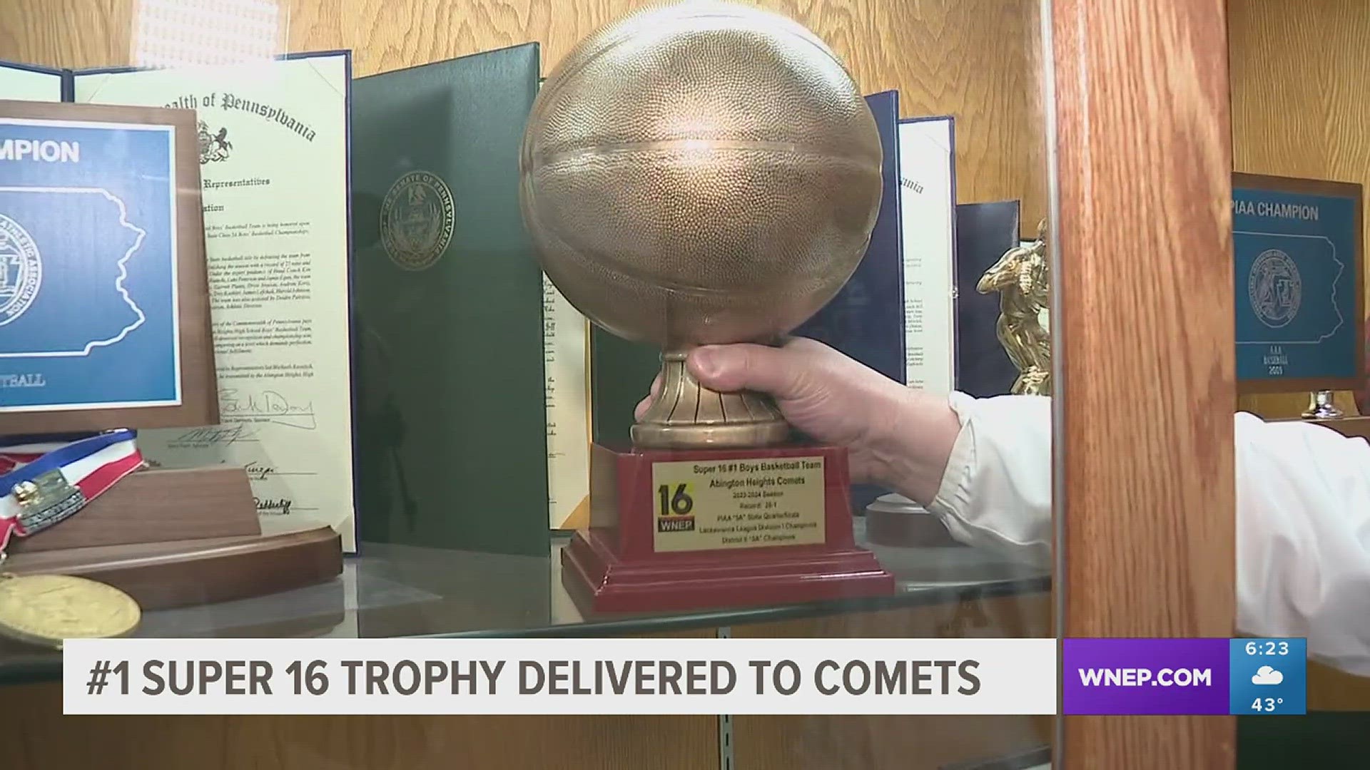 Abington Heights receives the #1 basketball trophy on Wednesday