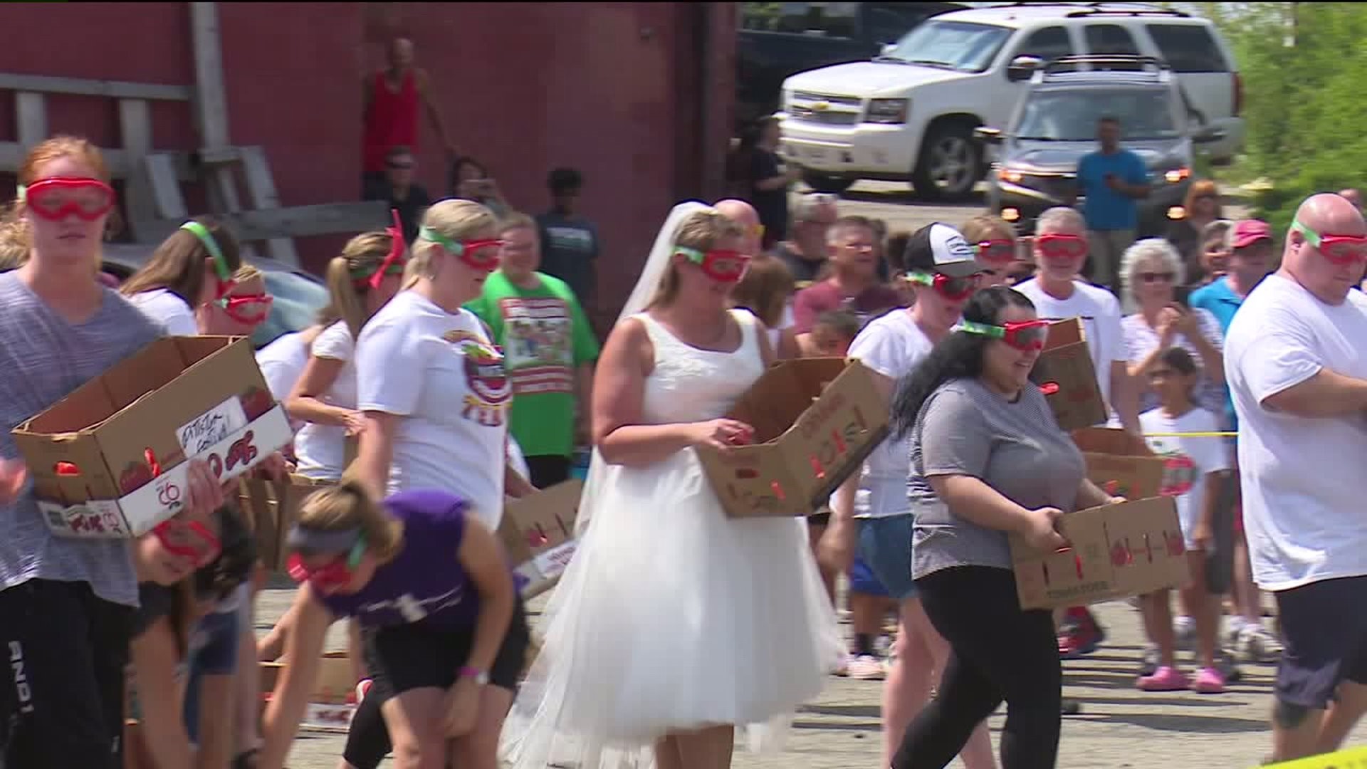 Woman Wears Wedding Dress to Pittston Tomato Fight