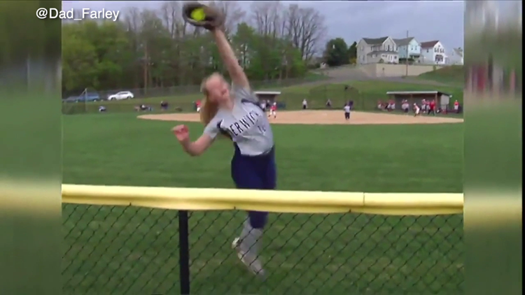 Mercer makes basket catch, tumbles over wall 