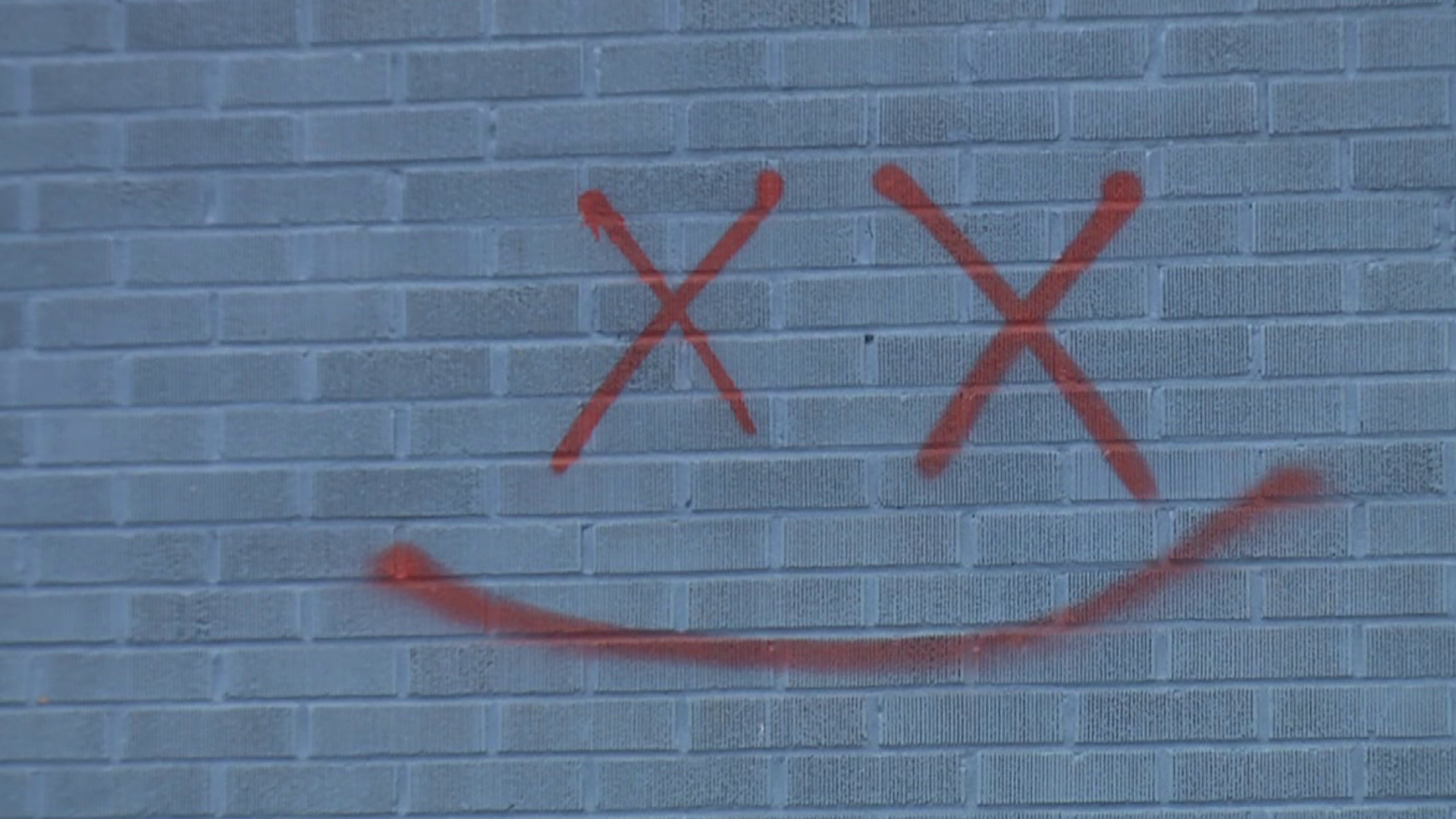 Graffiti faces have been spray-painted all over one neighborhood in Luzerne County.