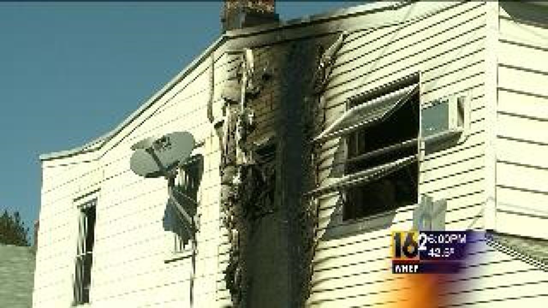 Two People Jump From Burning Home