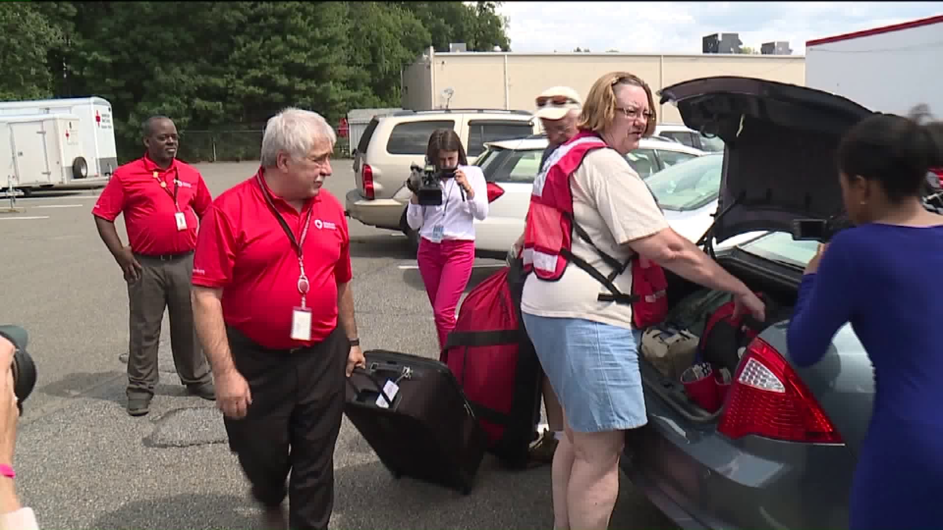 Couple Skip Vacation to Join Red Cross Flood Relief