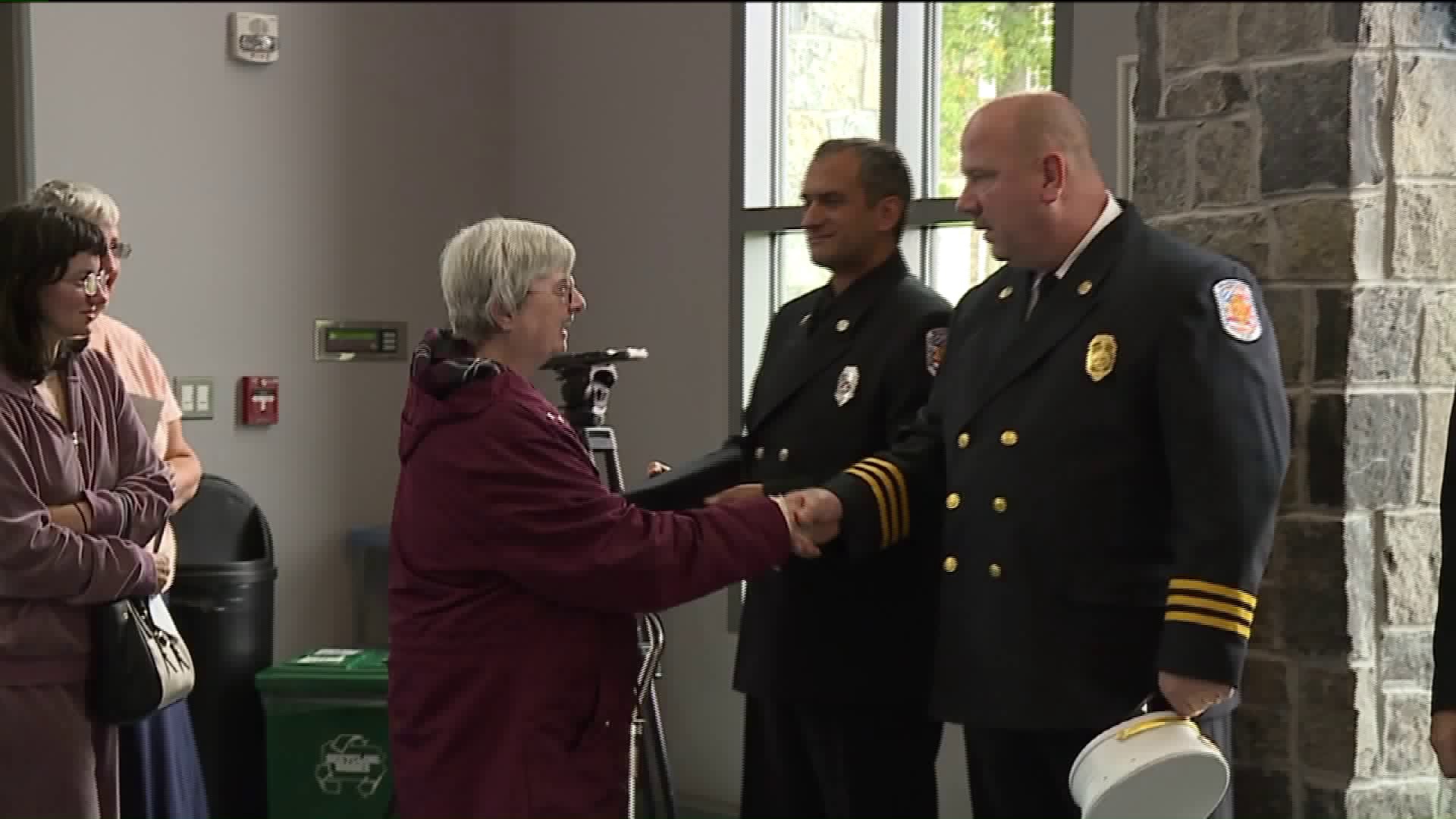Firefighters Honored For Saving Woman From Fire