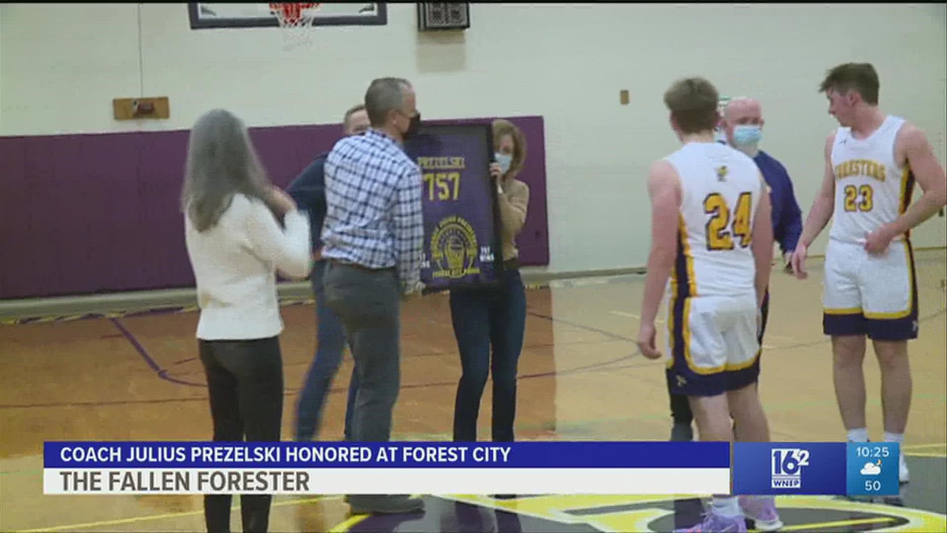 Forest City honored their late coach Julius Prezelski and his 757 career wins, but the Foresters lost to West Scranton 67-33 in boys HS baskeball.