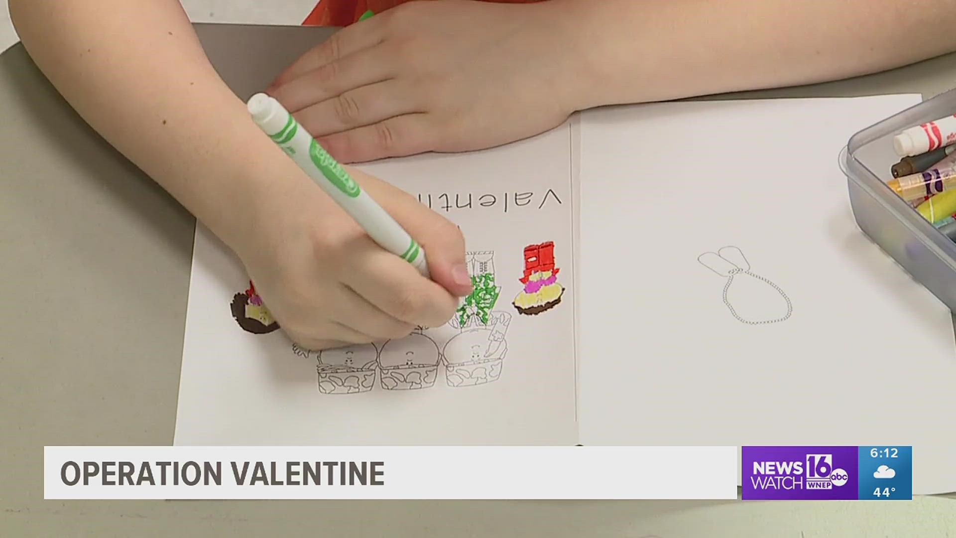 The program helps primary school students make Valentines for veterans.