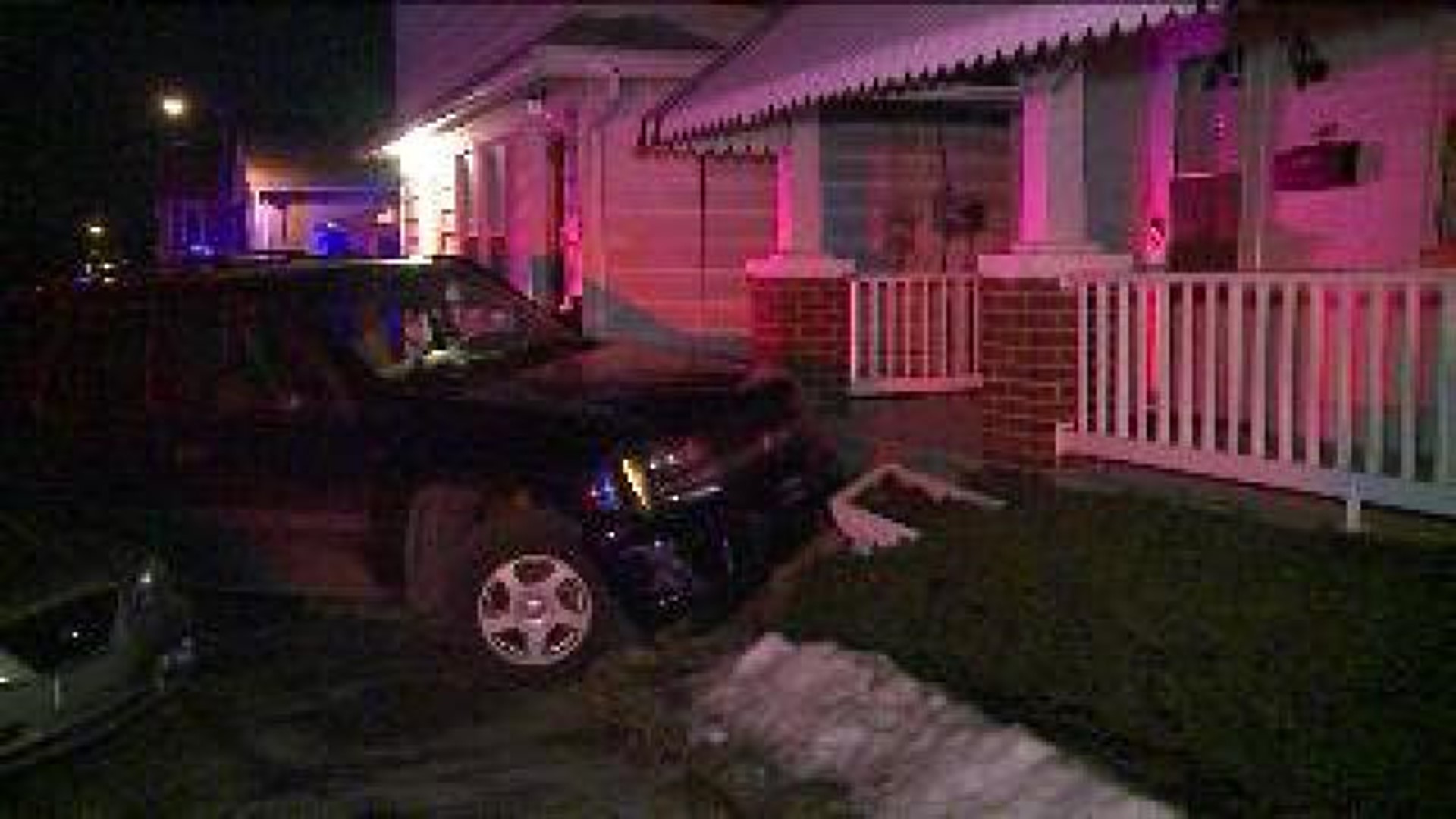 SUV Crashes into Home, Two Parked Cars