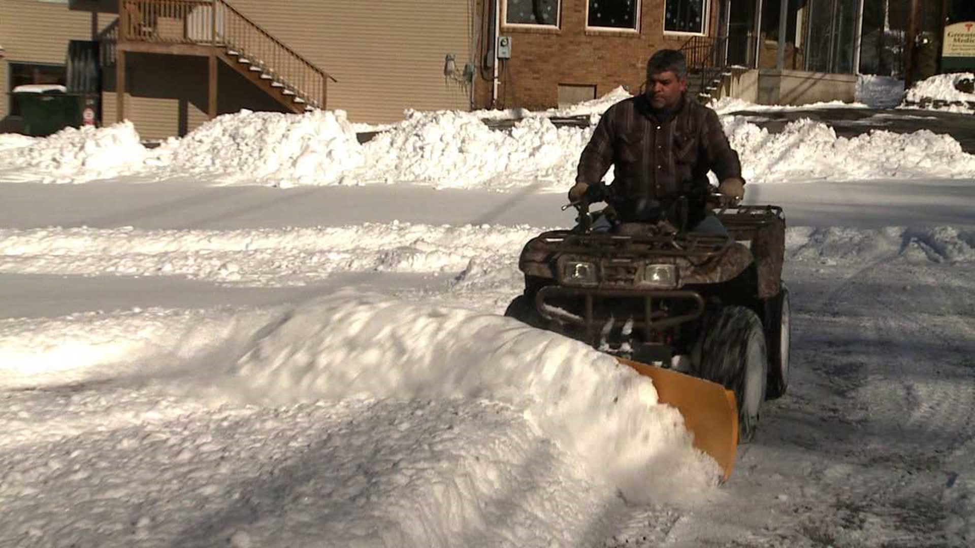 Residents Scramble with More Snow on the Way