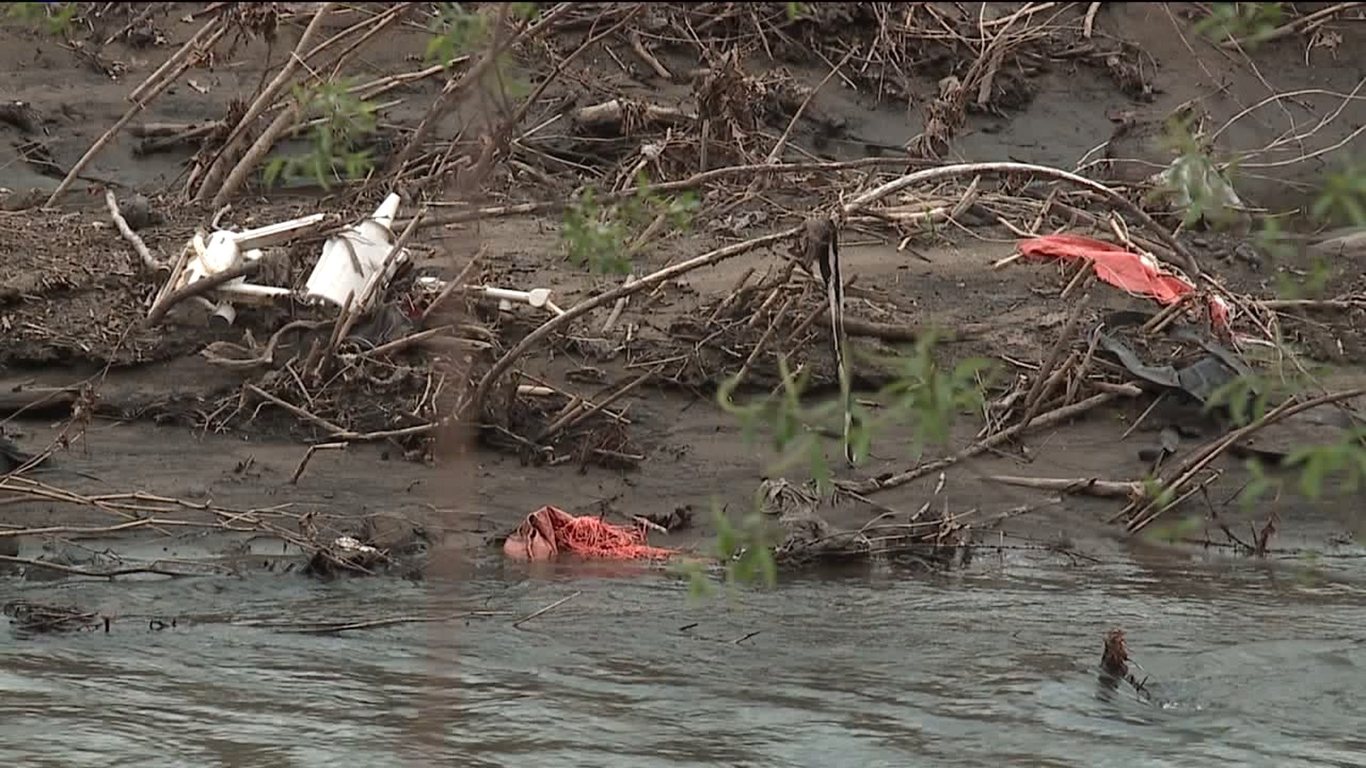 Debris from Bridge Demolition Litters Lackawanna Riverbanks