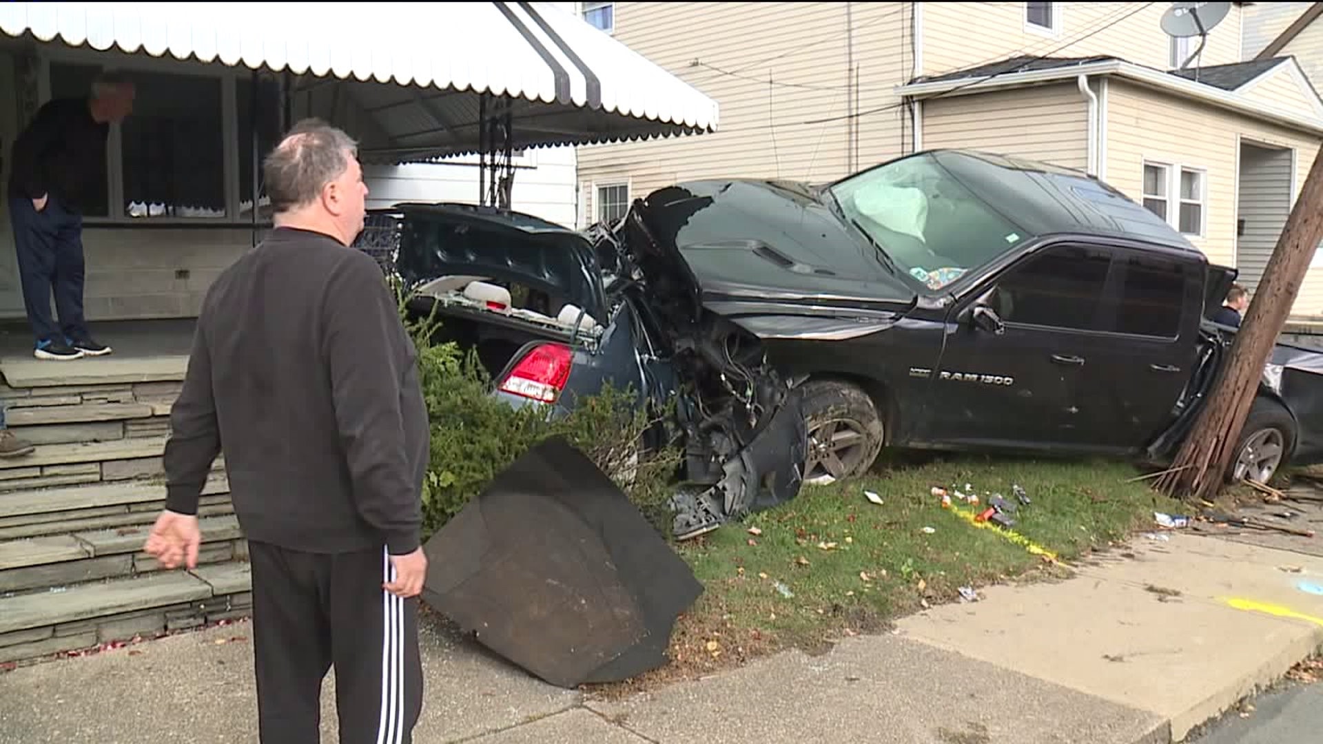 Driver Crashes Into Car, Porch in Scranton