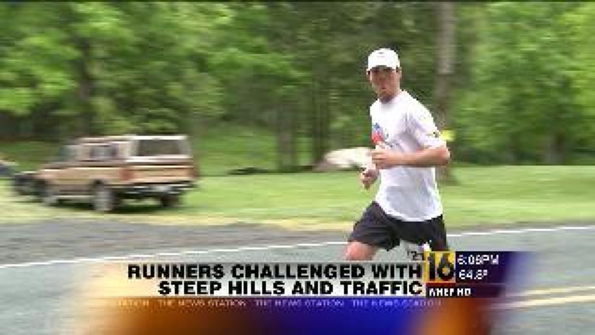 Runners Challenged With Steep Hills And Traffic