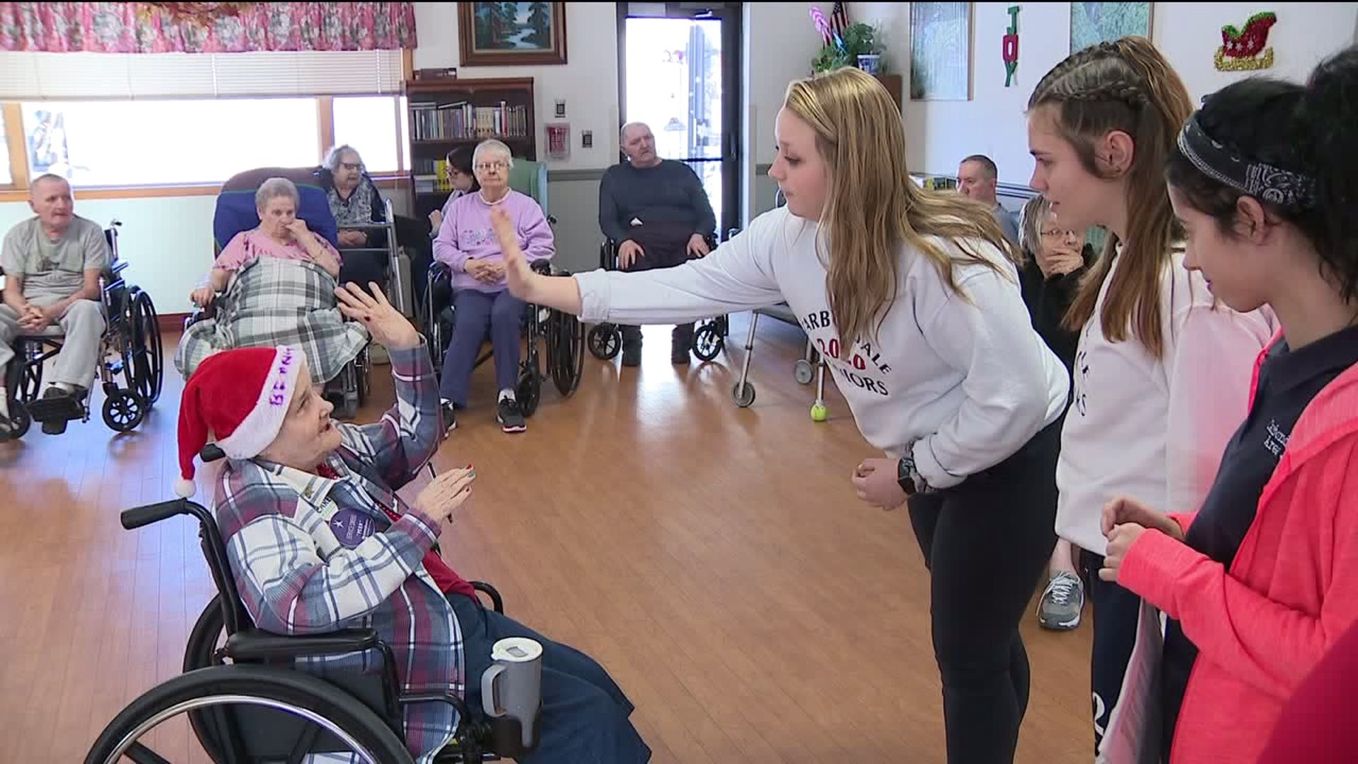 Carbondale Students get Nursing Home Residents in Christmas Spirit