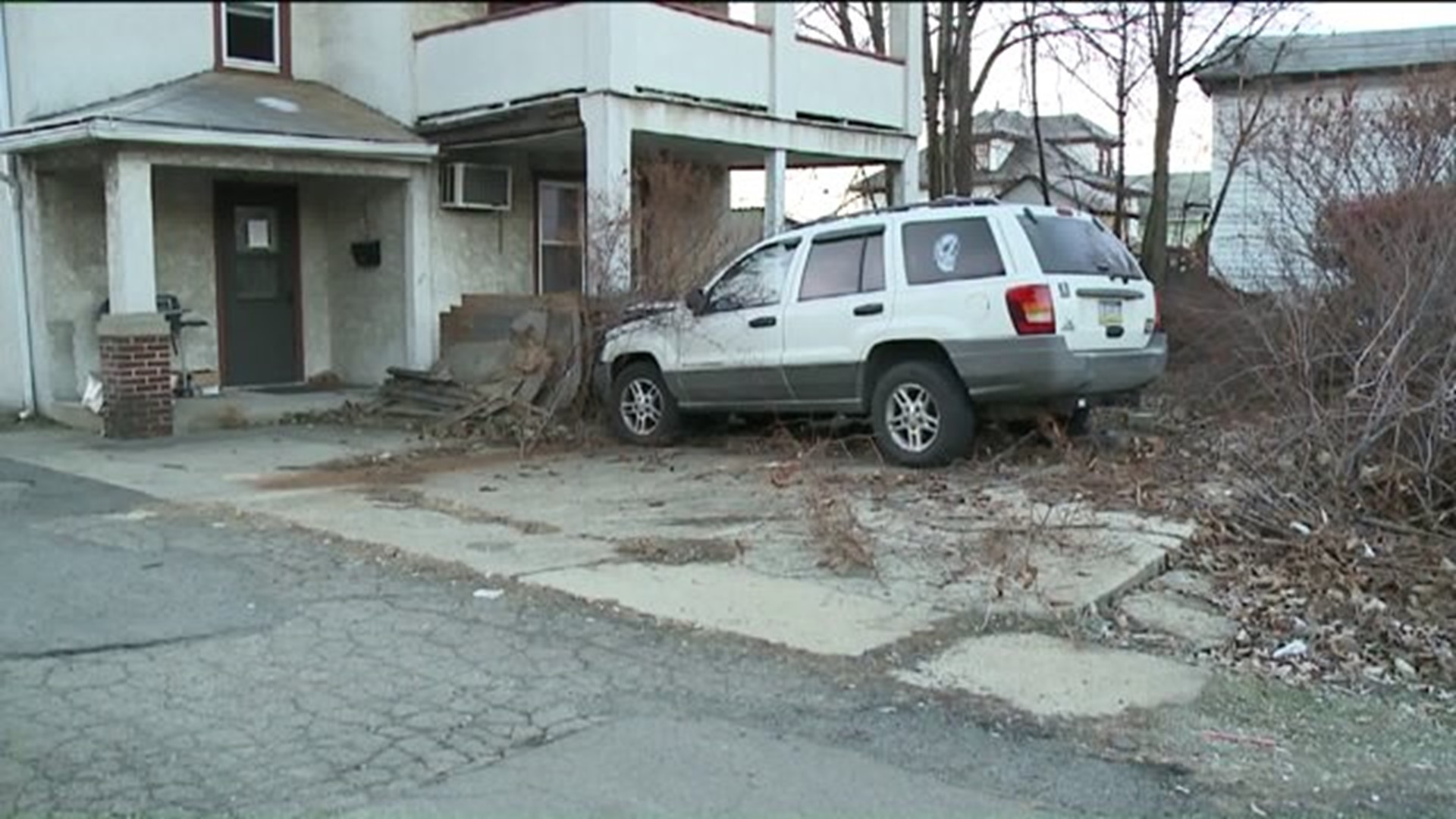 SUV Crashes Into Porch in Scranton