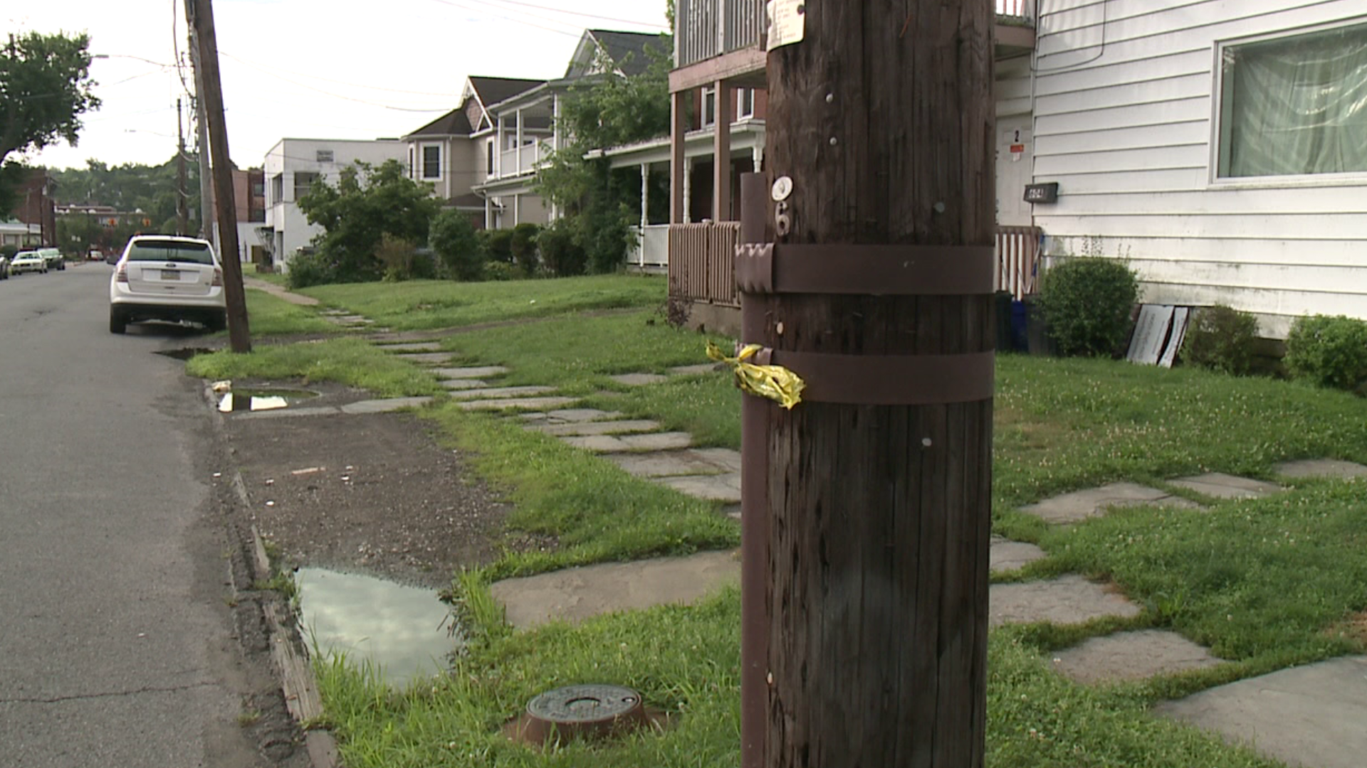 Officials say the man was found on a sidewalk in the city's Green Ridge section.