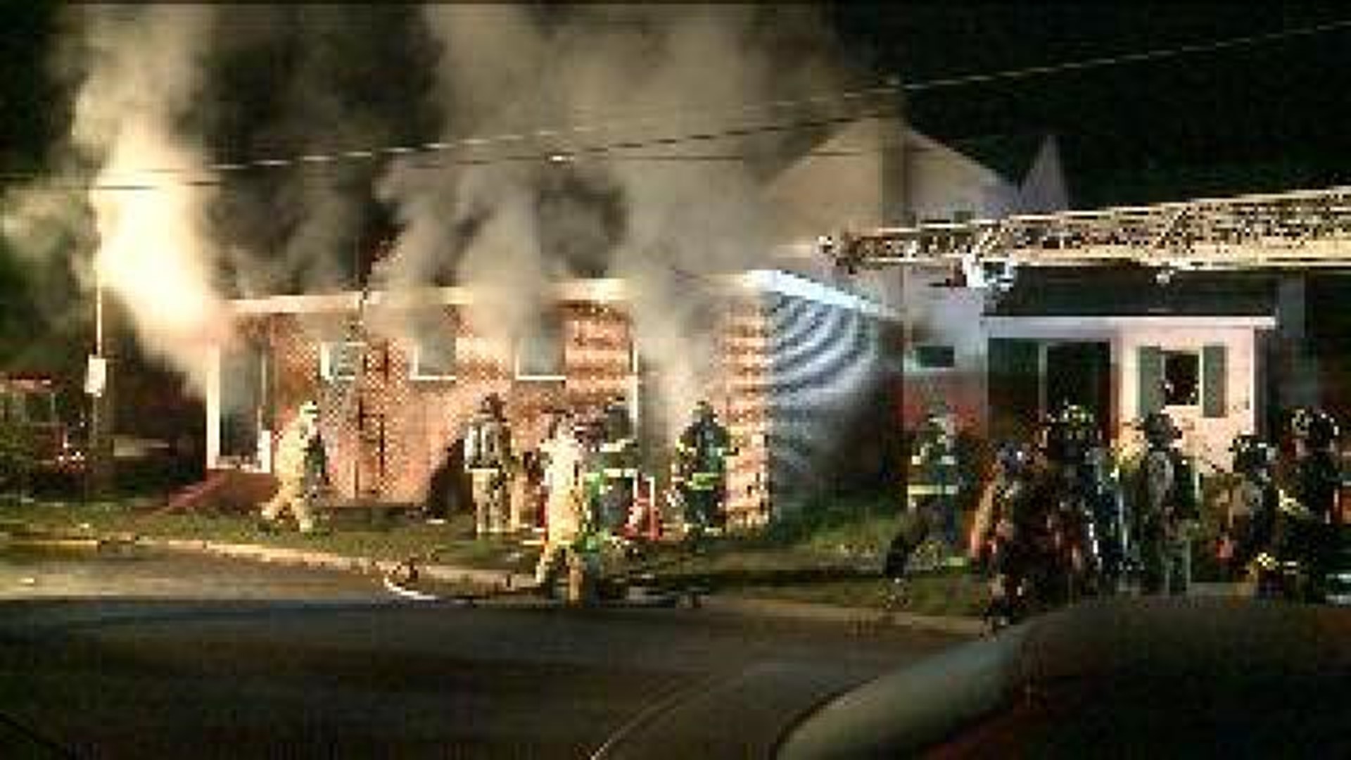 Smokey Fire Damages Vacant House, Storefront