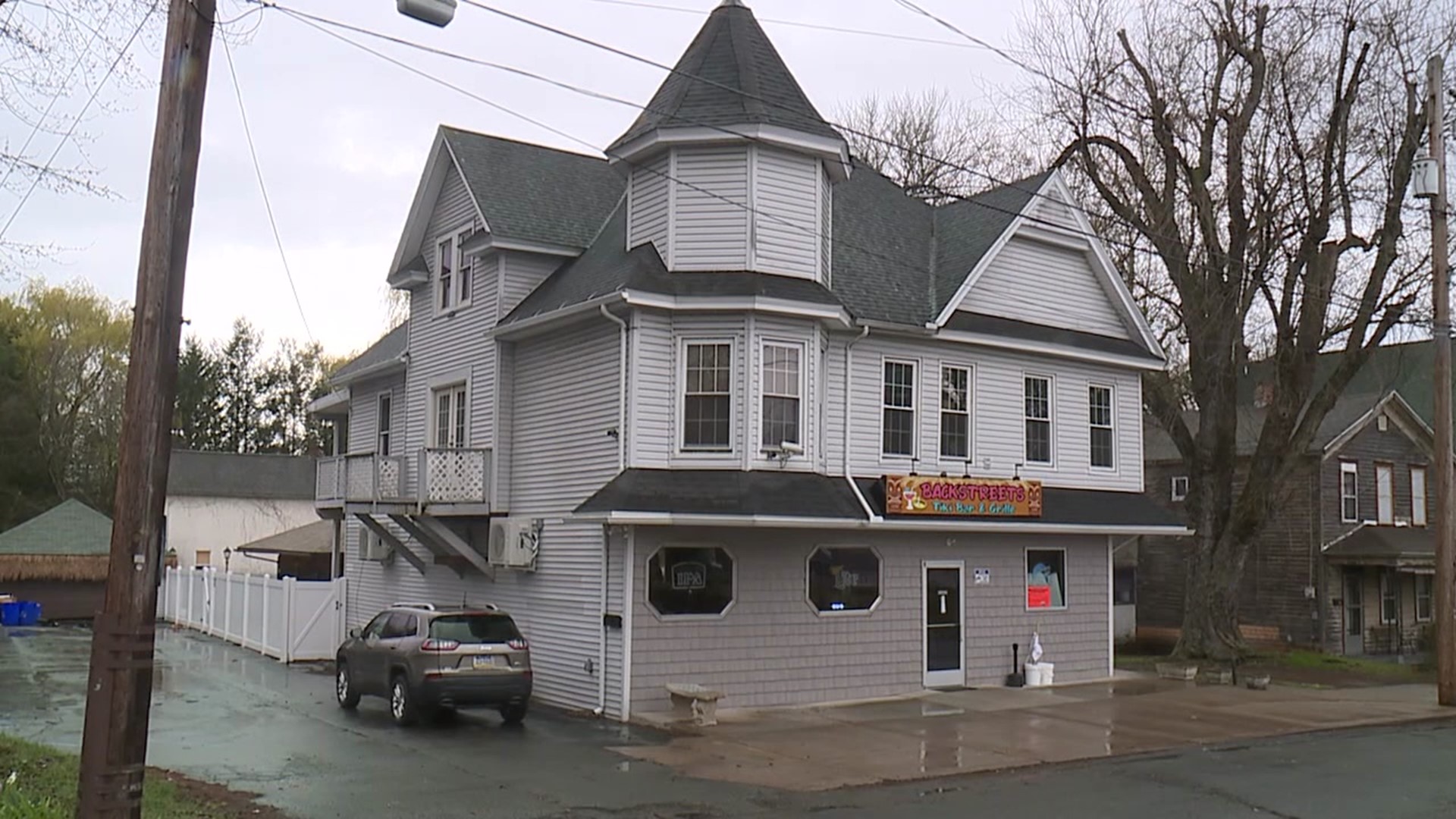 The owner of a bar and restaurant in Scranton says he feels like he was hit while he was already down.