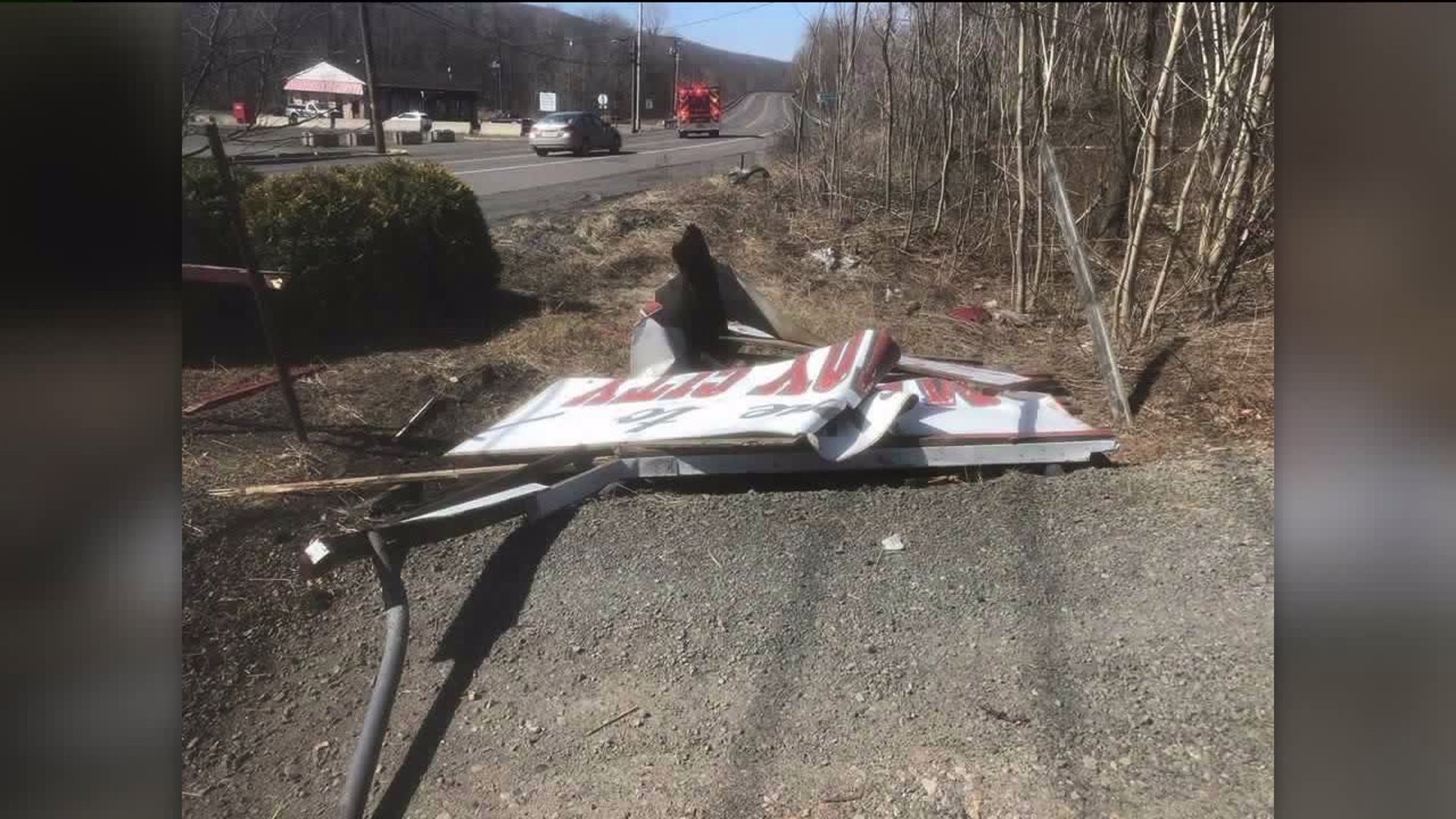 Driver Charged After Crashing into Welcome Sign