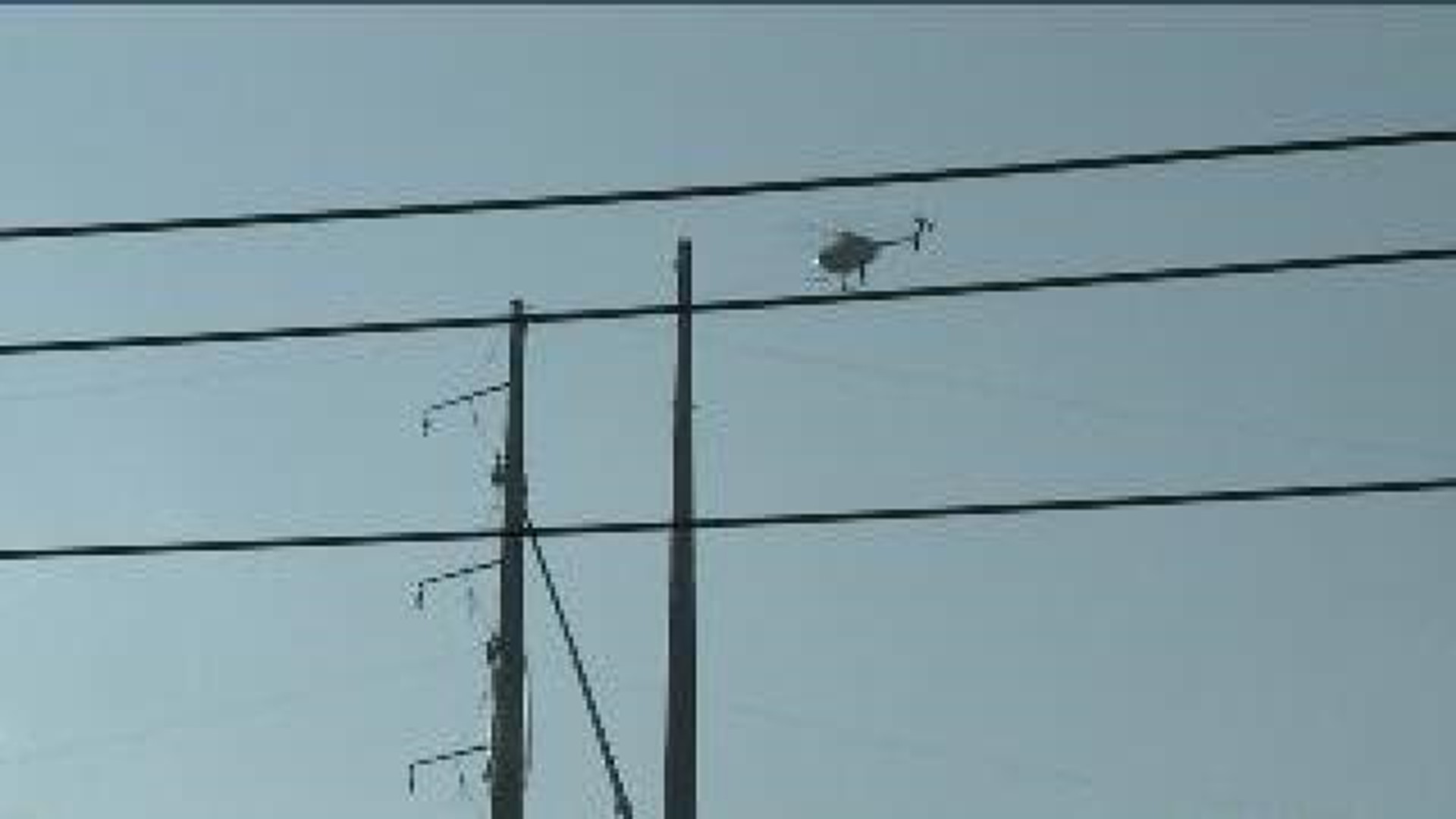 Helicopter Hangs Wires High Over Lackawanna County